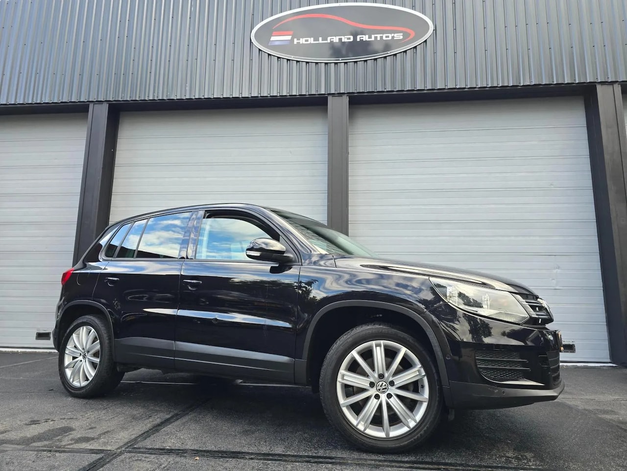 Volkswagen Tiguan - 1.4 TSI Sport Style - AutoWereld.nl