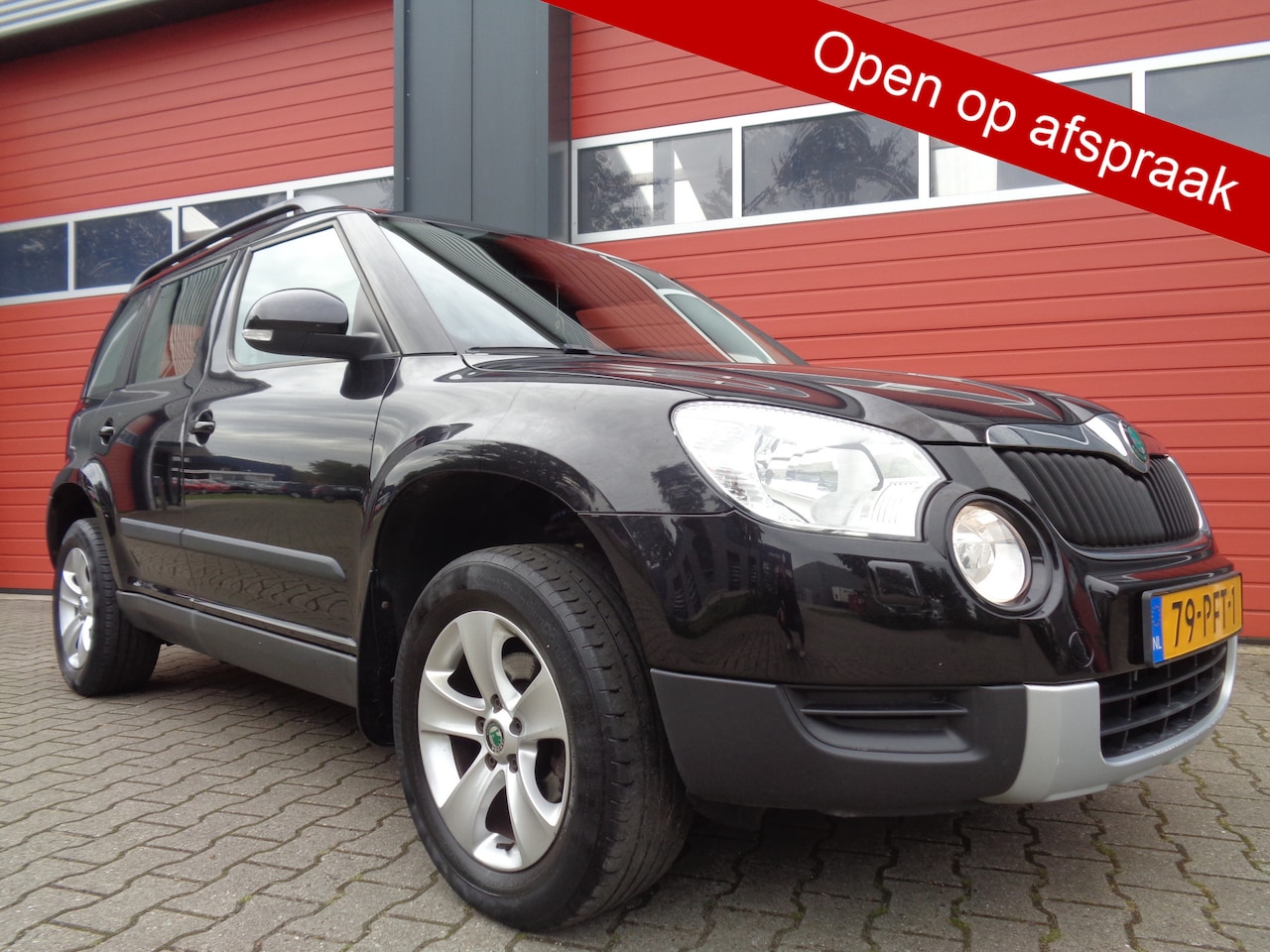 Skoda Yeti - 1.2 TSI Ambition 105PK Automaat Clima Cruise LMV Terkhaak NL-Auto 2E-Eigenaar - AutoWereld.nl