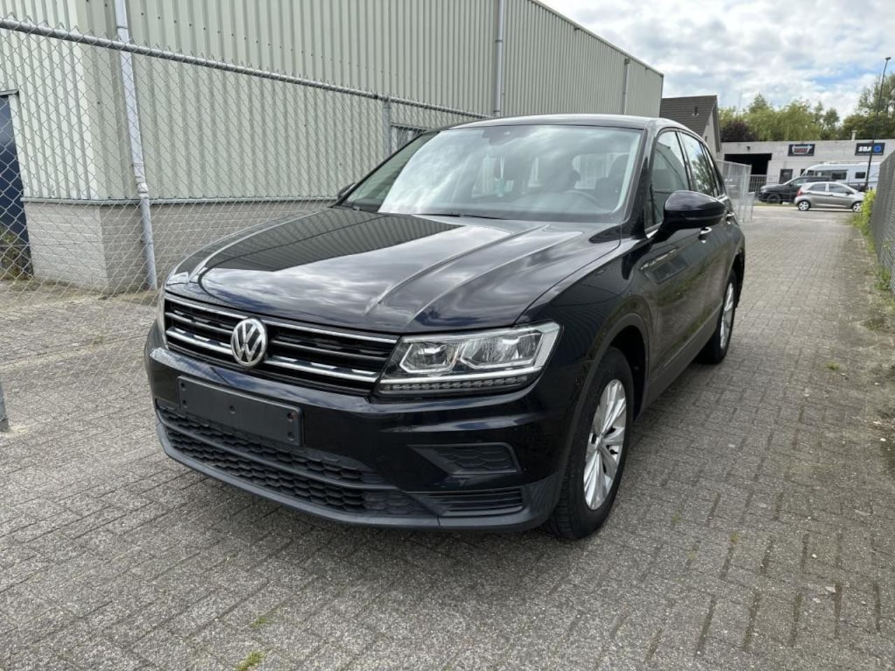 Volkswagen Tiguan - 1.4 TSI RIJDBARE SCHADE|KEYLESS|APP-C|PDC - AutoWereld.nl