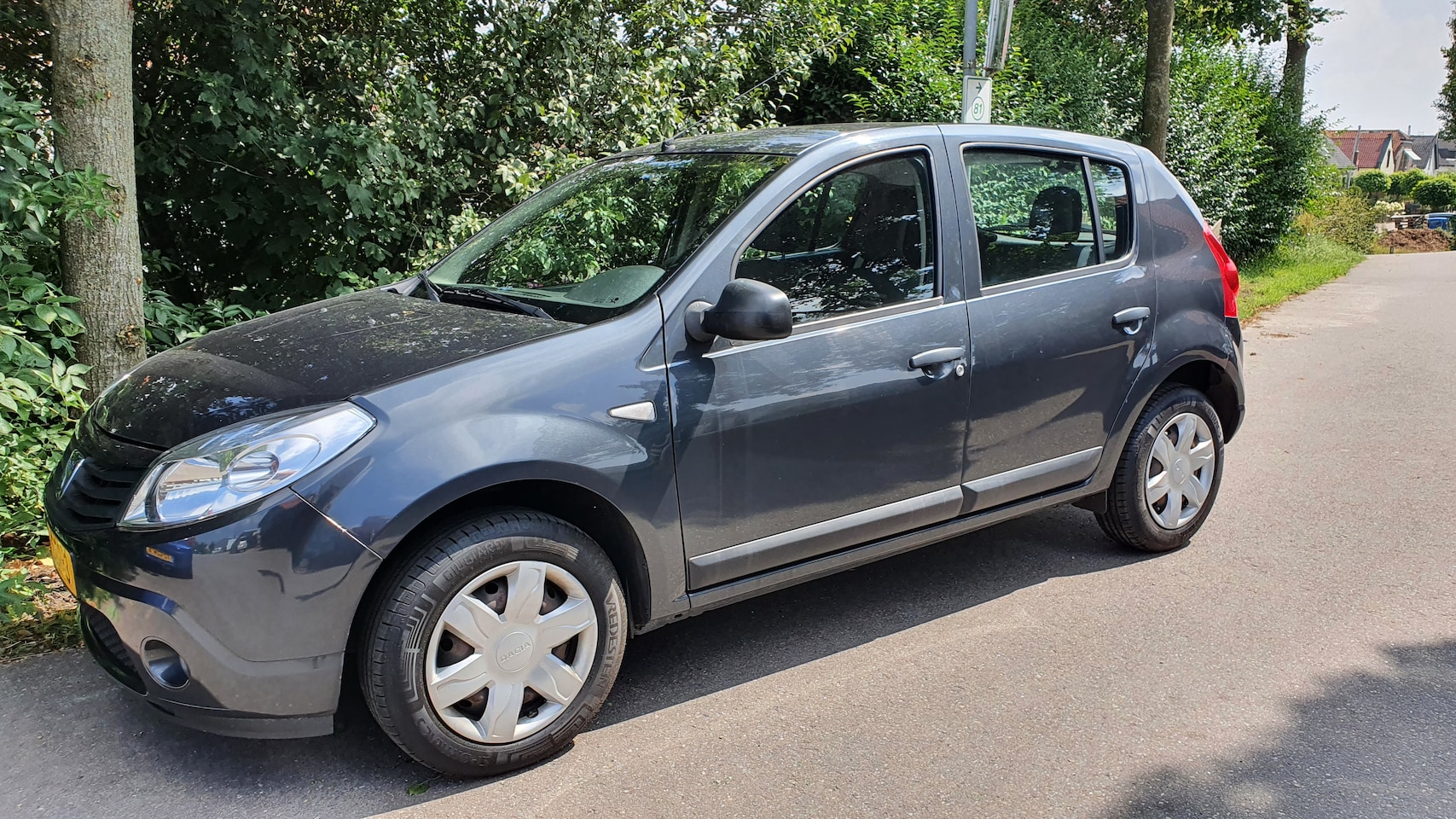 Dacia Sandero - 1.2 Aniversare LPG - AutoWereld.nl