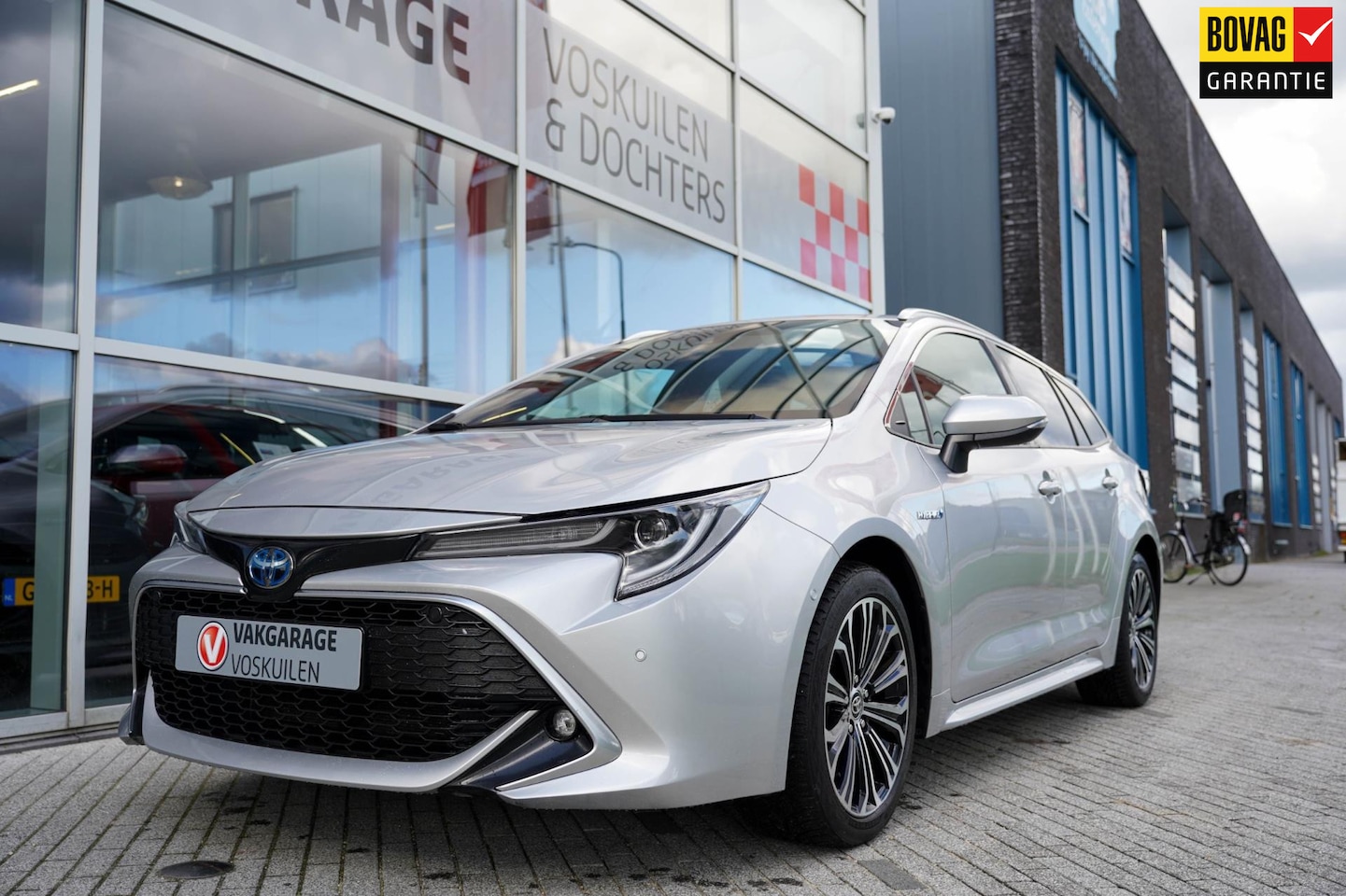 Toyota Corolla Touring Sports - 1.8 Hybrid Executive Premium - AutoWereld.nl