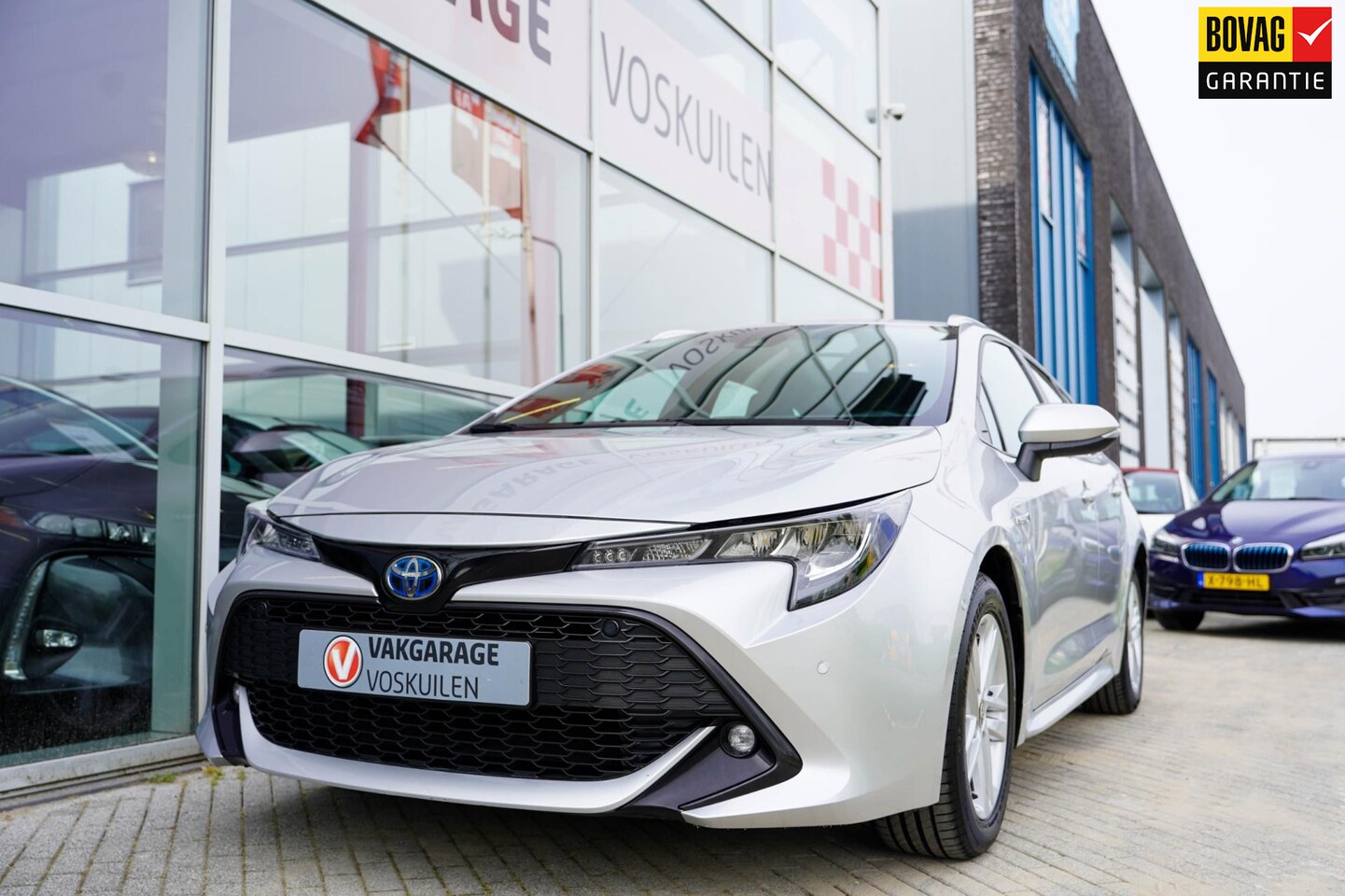 Toyota Corolla Touring Sports - 1.8 Hybrid Business |Apple Carplay| Navi | Stoelverw - AutoWereld.nl