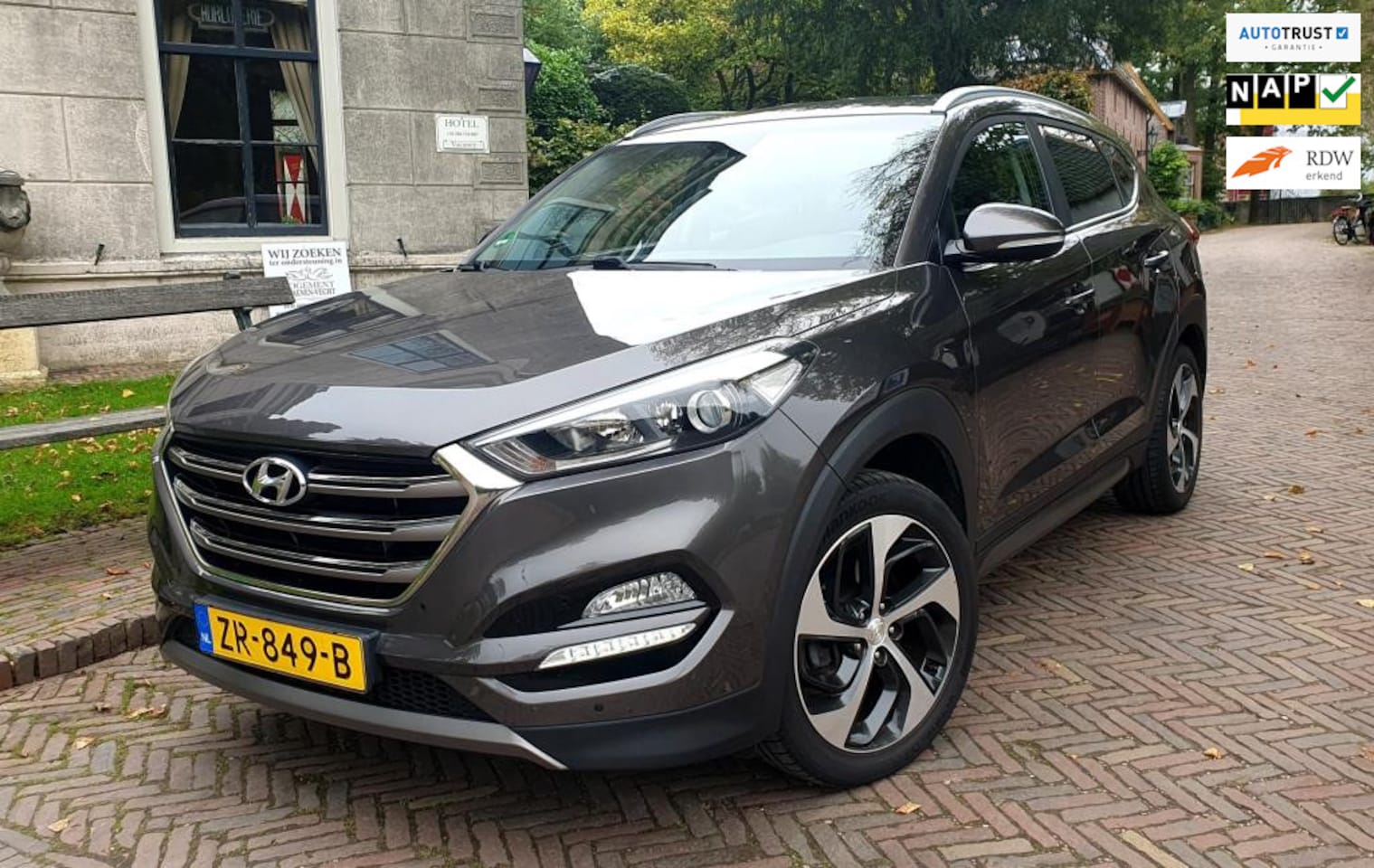 Hyundai Tucson - 1.6 GDi Premium/leder/clima/navi/trekhaak/ - AutoWereld.nl