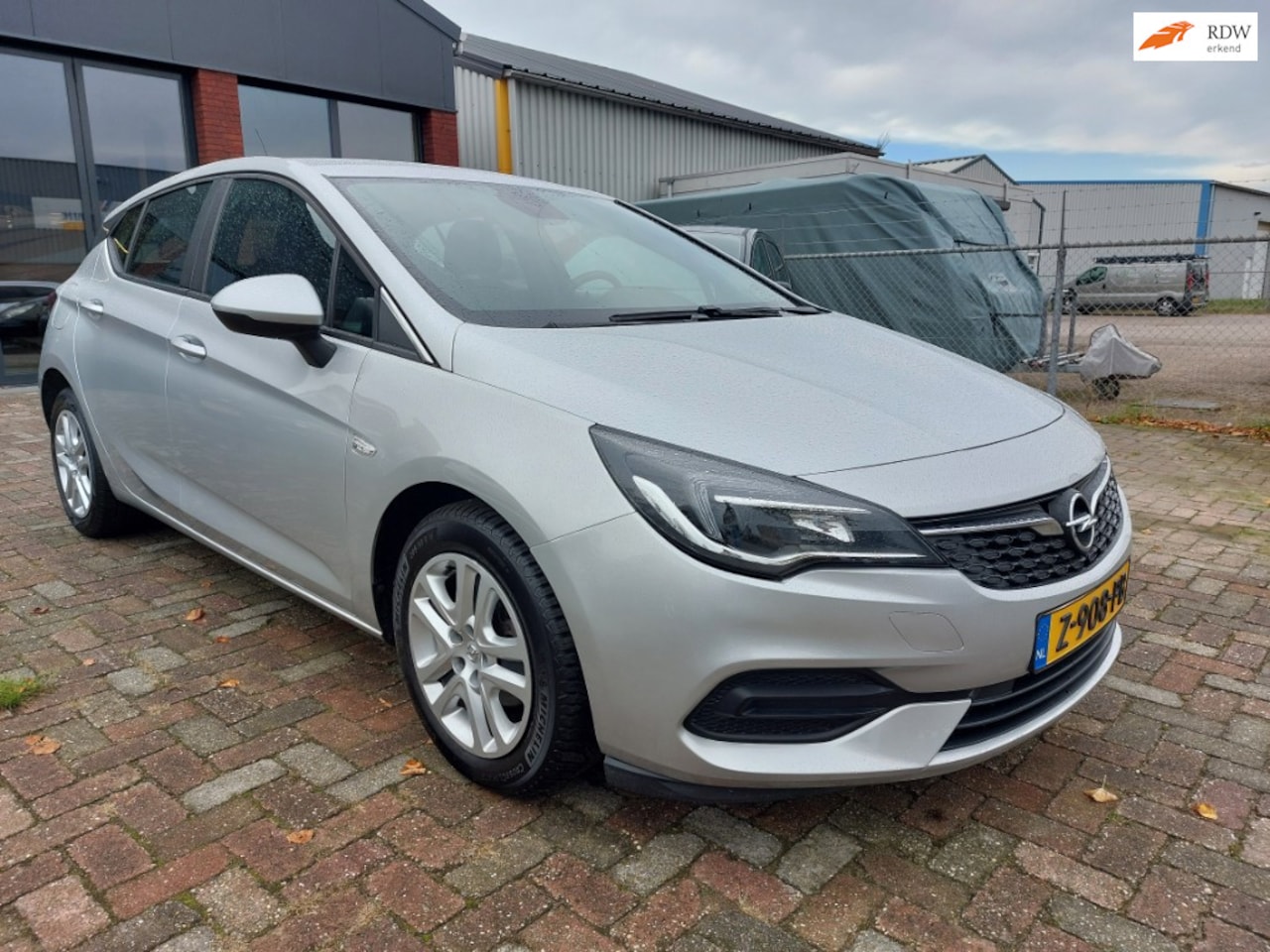 Opel Astra - 1.2 Business Edition-NL AUTO-AIRCO-CRUISE-NAVI - AutoWereld.nl