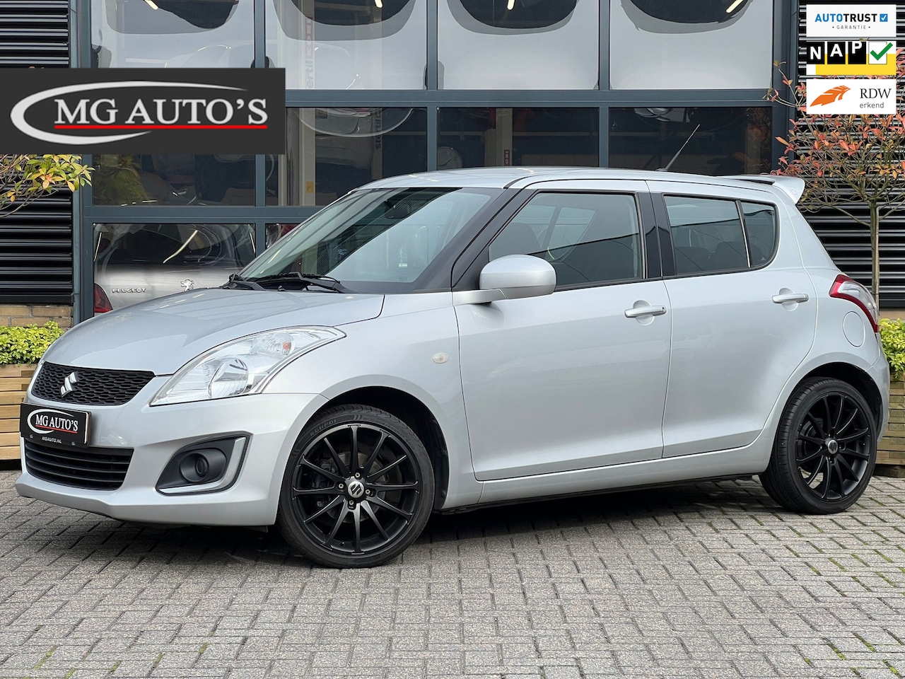 Suzuki Swift - 1.2 Bandit EASSS | Dakragers | Airco | LM Velgen | MF Stuurwiel | Elektrische Spiegels/Ram - AutoWereld.nl