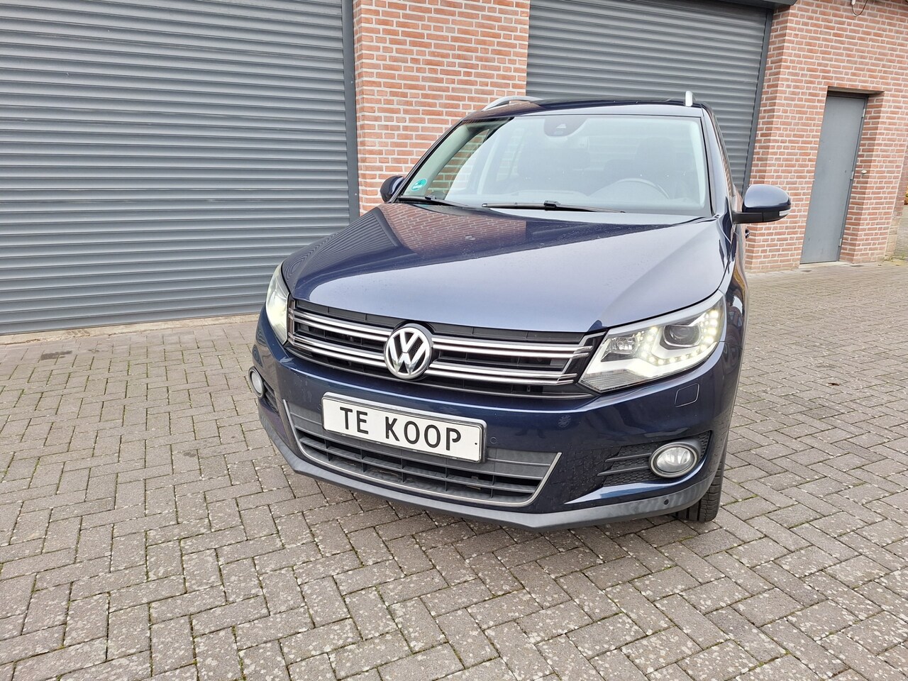 Volkswagen Tiguan - 1.4 TSI Sport&Style - AutoWereld.nl