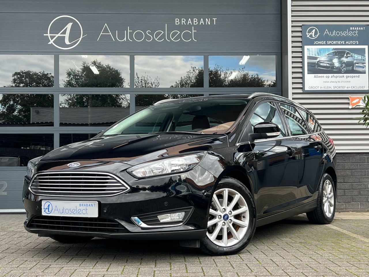 Ford Focus Wagon - 1.0 Titanium Clima Cruise PDC - AutoWereld.nl