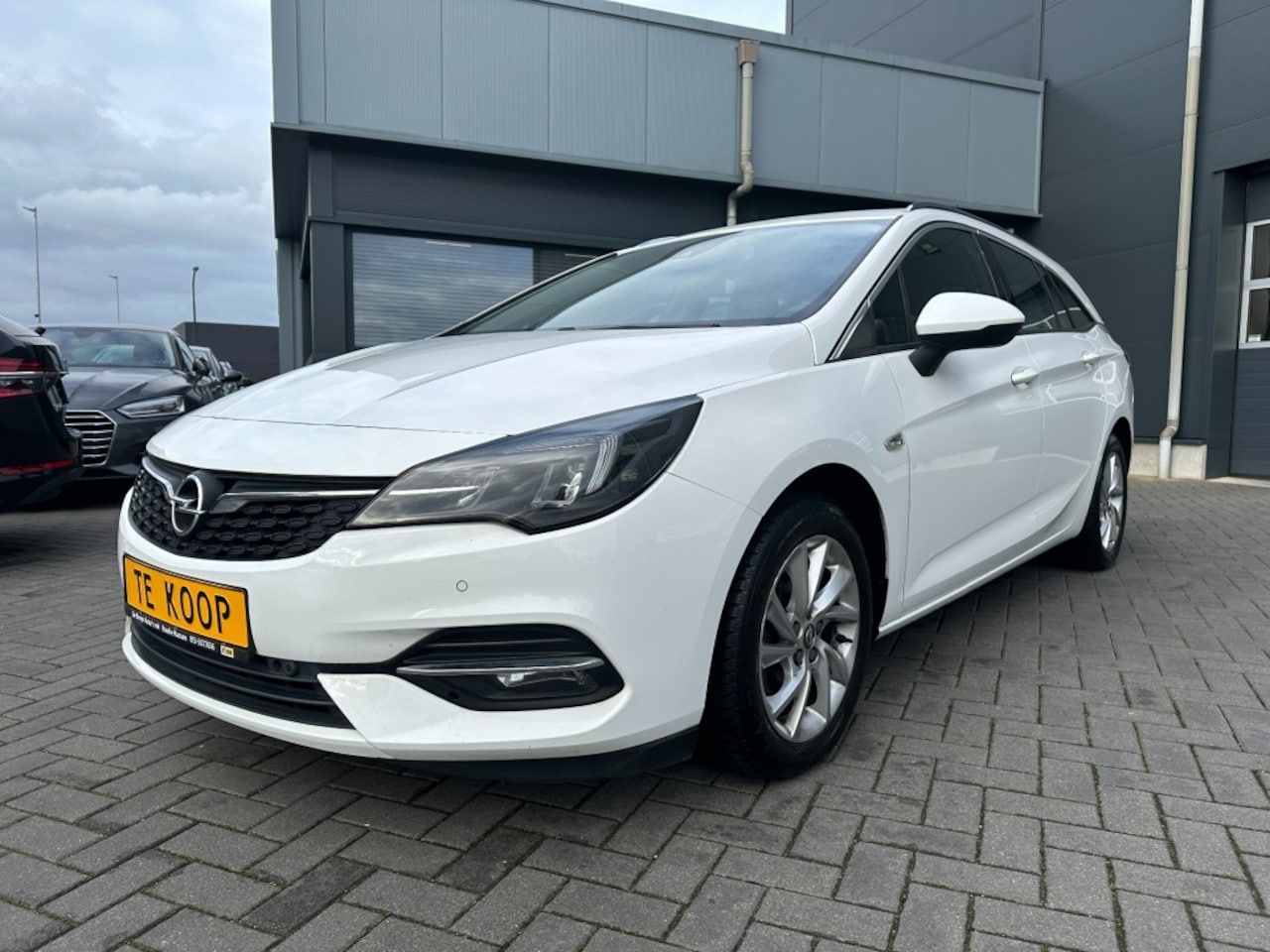 Opel Astra Sports Tourer - Sports Tourer 1.2T Business Elegance Navigatie - AutoWereld.nl