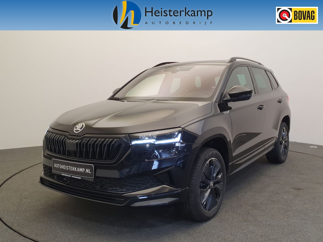 Skoda Karoq - 1.5 TSI 150pk DSG/AUT Sportline Wegklapbare trekhaak, Panoramadak, ACC - AutoWereld.nl