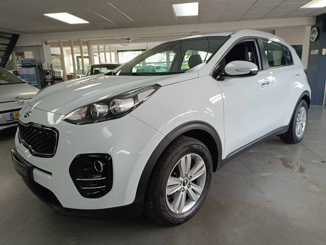 Kia Sportage - 1.6 GDI ComfortLine Navigator 1.6 GDI ComfortLine Navigator - AutoWereld.nl