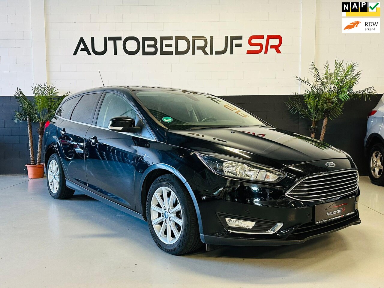 Ford Focus Wagon - 1.0 Titanium Navigatie! Cruise Controle! PDC! Parkpilot! Boekjes! Garantie! - AutoWereld.nl