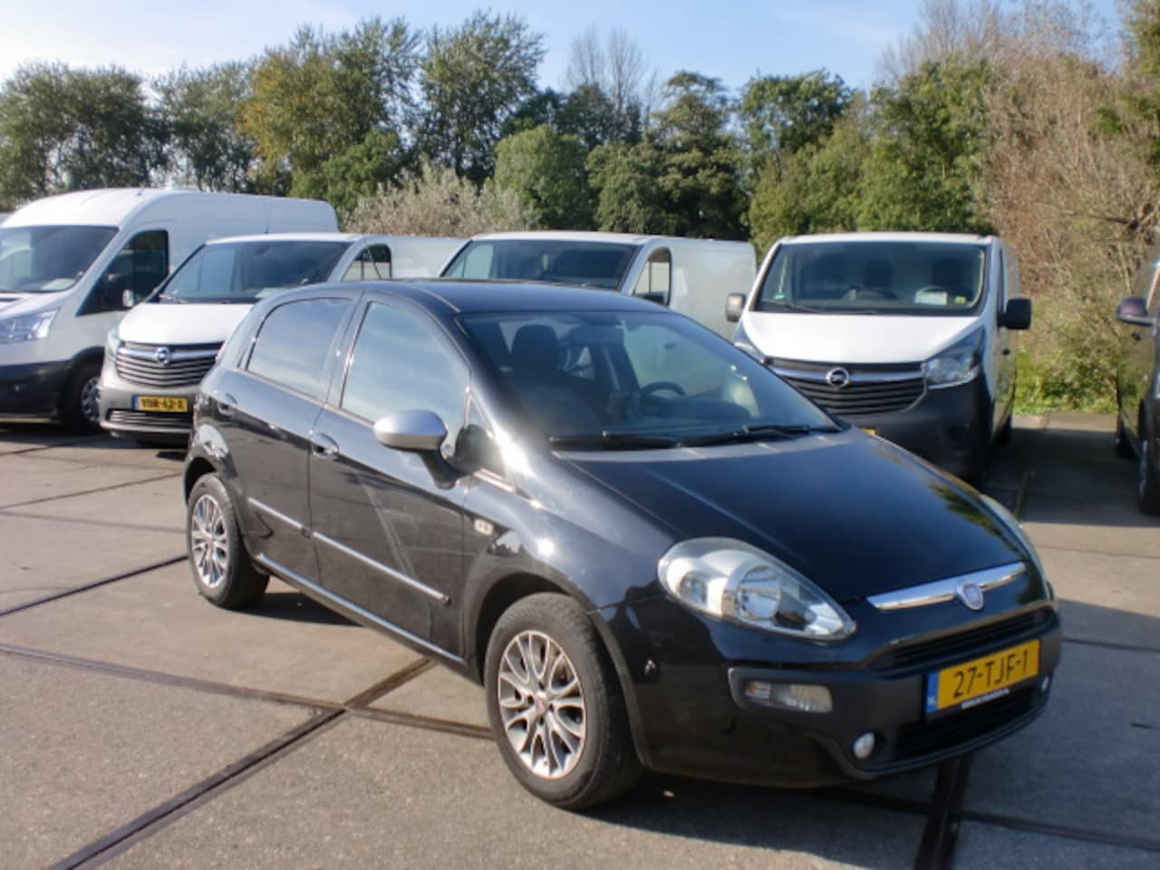 Fiat Punto Evo - 1.4 MULTI-AIR 77KW 5DRS BJ2012 ZWART NAP - AutoWereld.nl