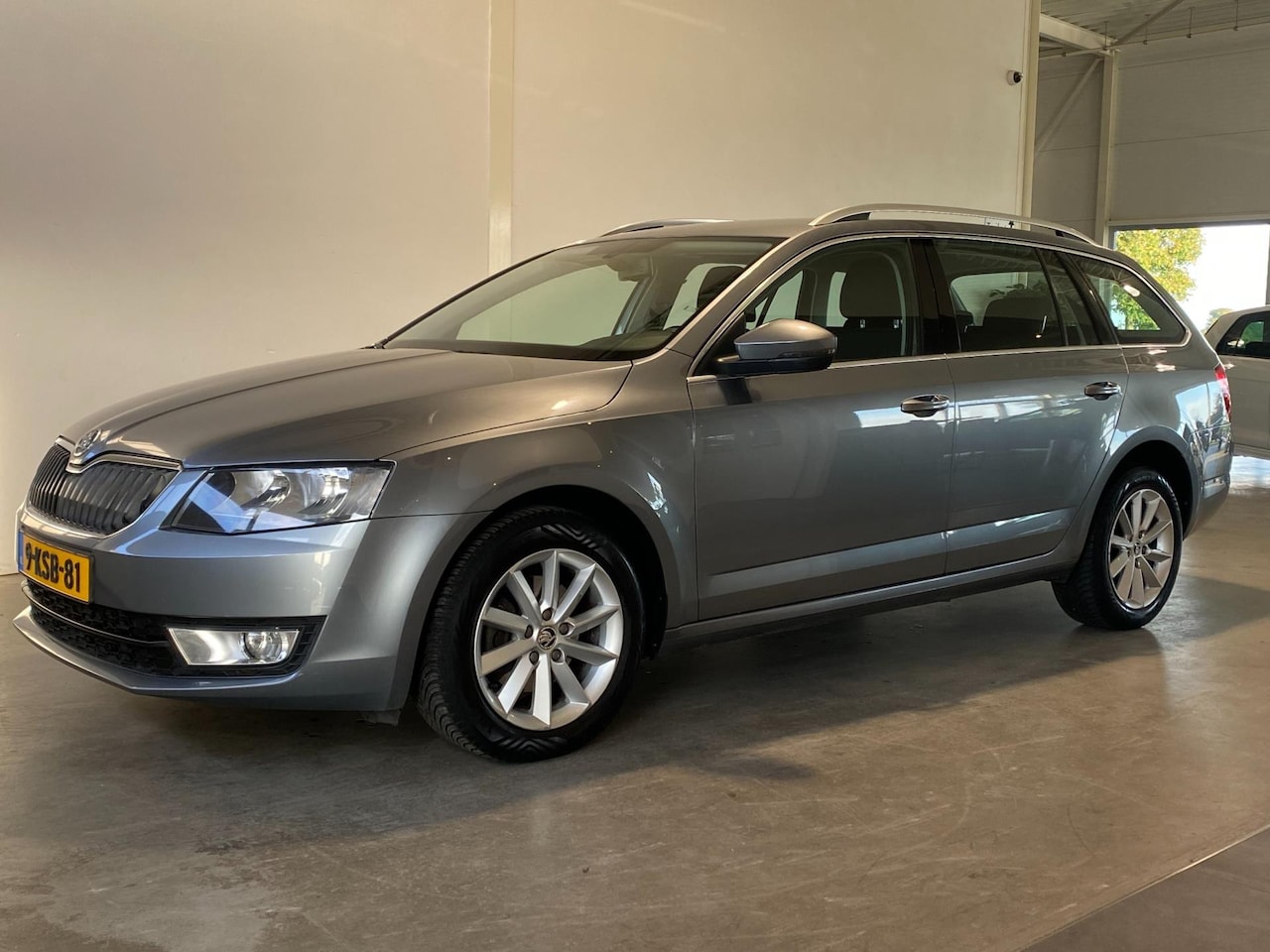 Skoda Octavia Combi - 1.2 TSI Elegance Navi Trekhaak NL-auto - AutoWereld.nl