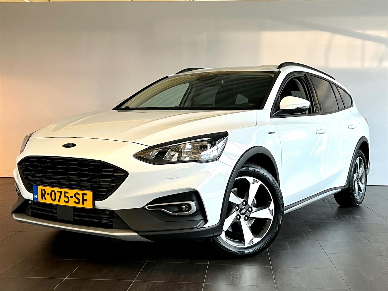 Ford Focus Wagon - 1.0 EcoBoost 125PK ACTIVE AUTOMAAT NAVI CAMERA PDC ECC WINTERPACK - AutoWereld.nl