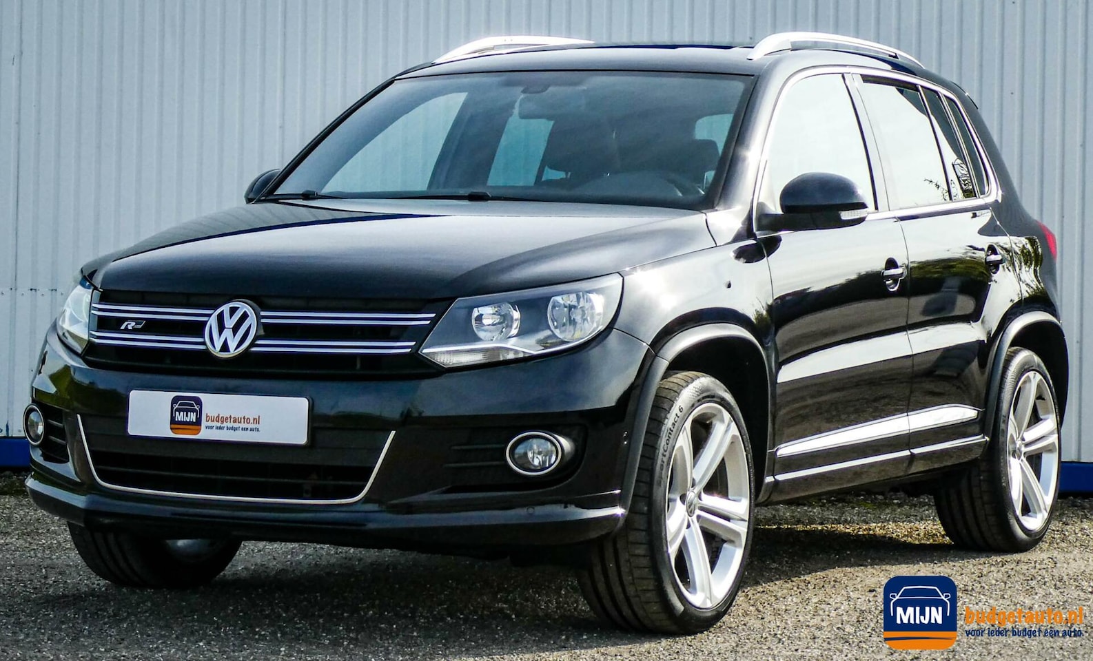 Volkswagen Tiguan - 1.4 TSI Sport&Style R-line Edition NL Auto - AutoWereld.nl