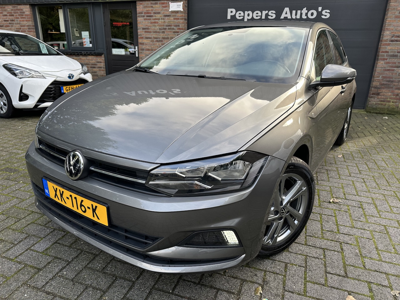 Volkswagen Polo - 1.0 TSI Comfortline Business sportvelgen apple carplay stoel verwarming navi cruise contr - AutoWereld.nl