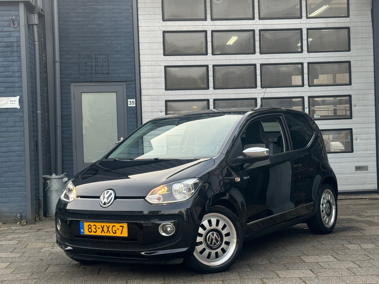 Volkswagen Up! - 1.0 High Up! BlueMotion | Airco | Navi | LMV | N.A.P - AutoWereld.nl