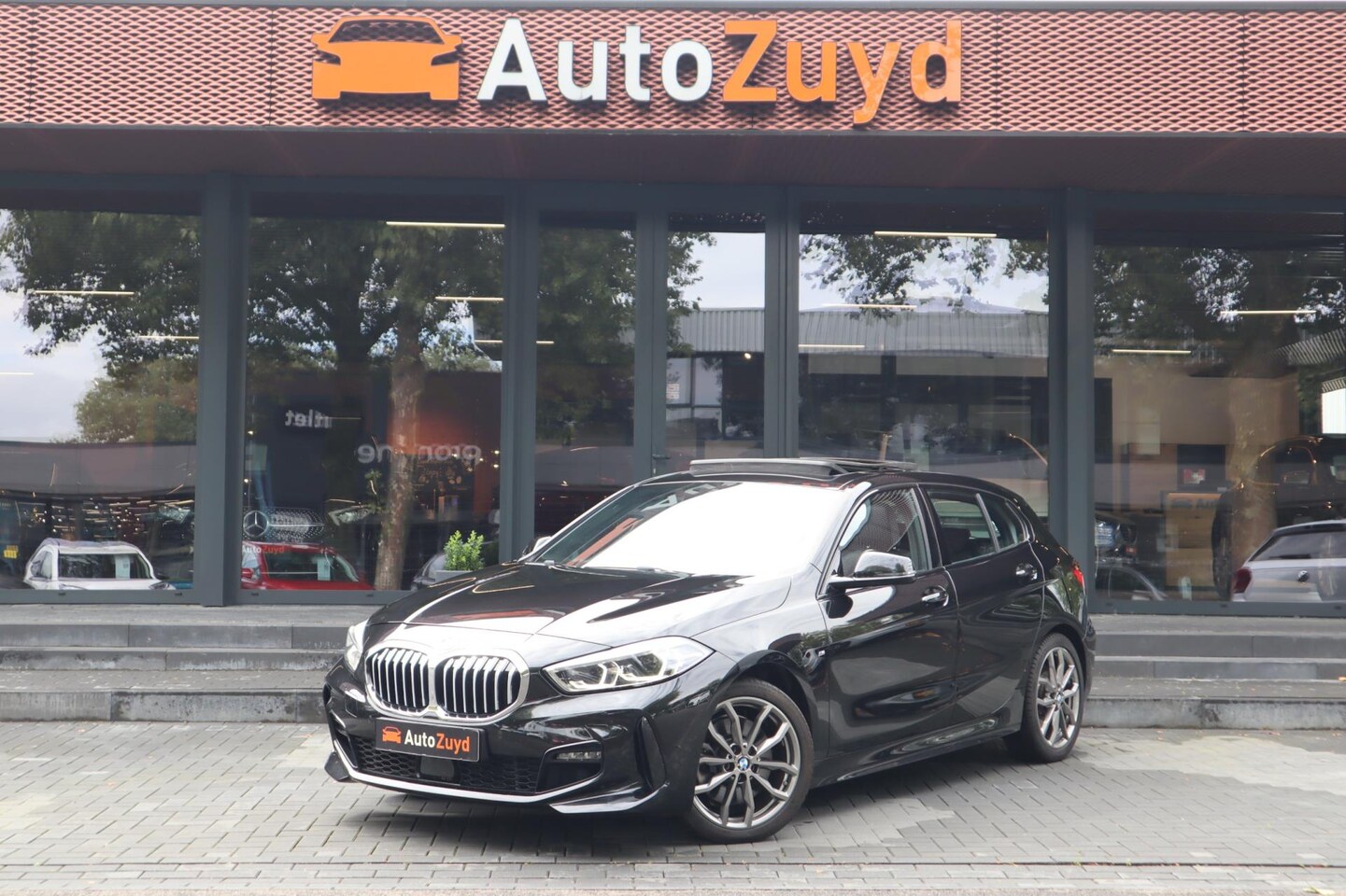 BMW 1-serie - 120i High Executive M-Sport Navi / DAB / CarPlay / Pano / Digital Key - AutoWereld.nl