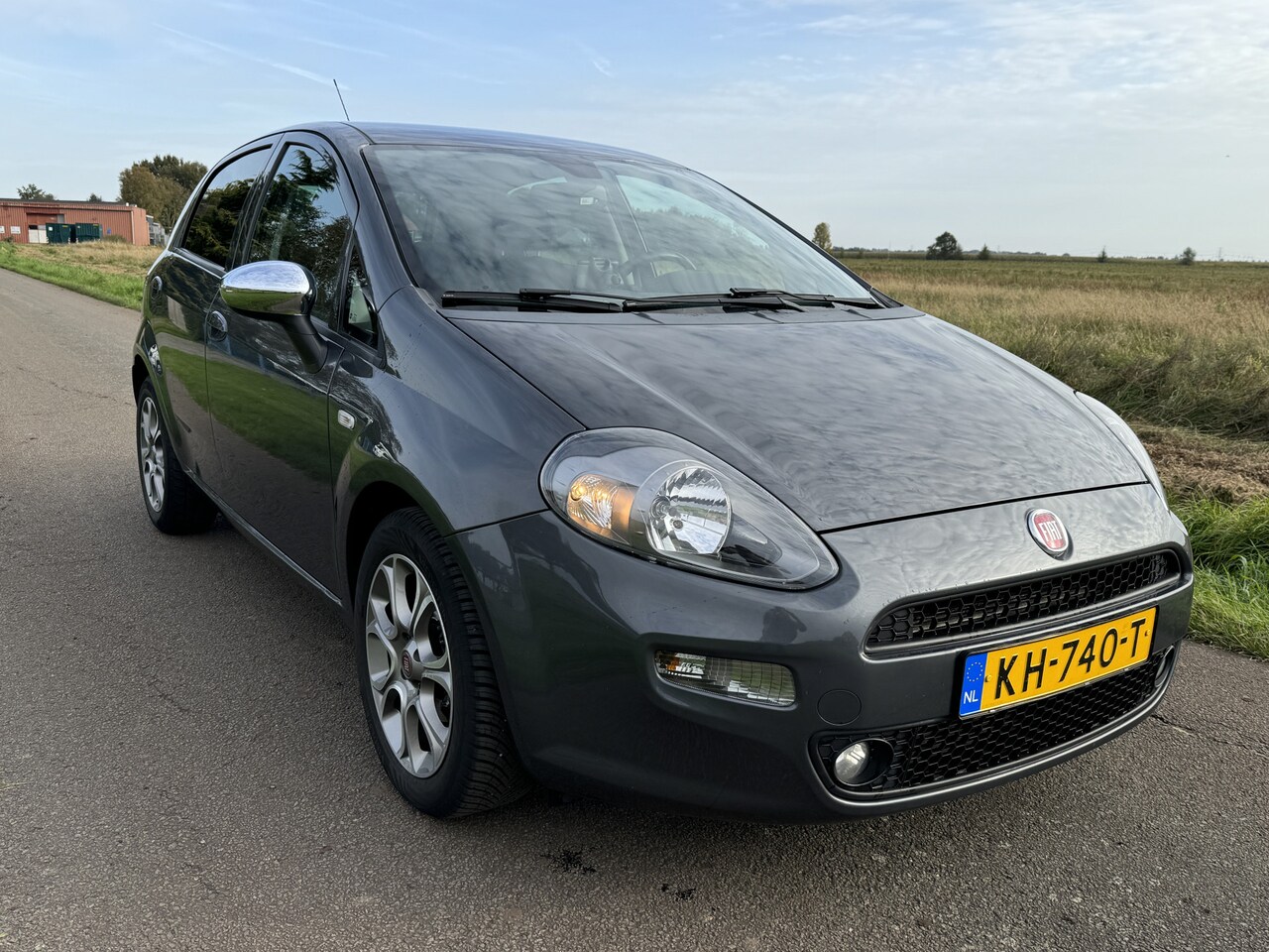 Fiat Punto Evo - 0.9 TwinAir Lounge ECC/CRUISE/LMV/5-DRS/151.000km!! NAP - AutoWereld.nl