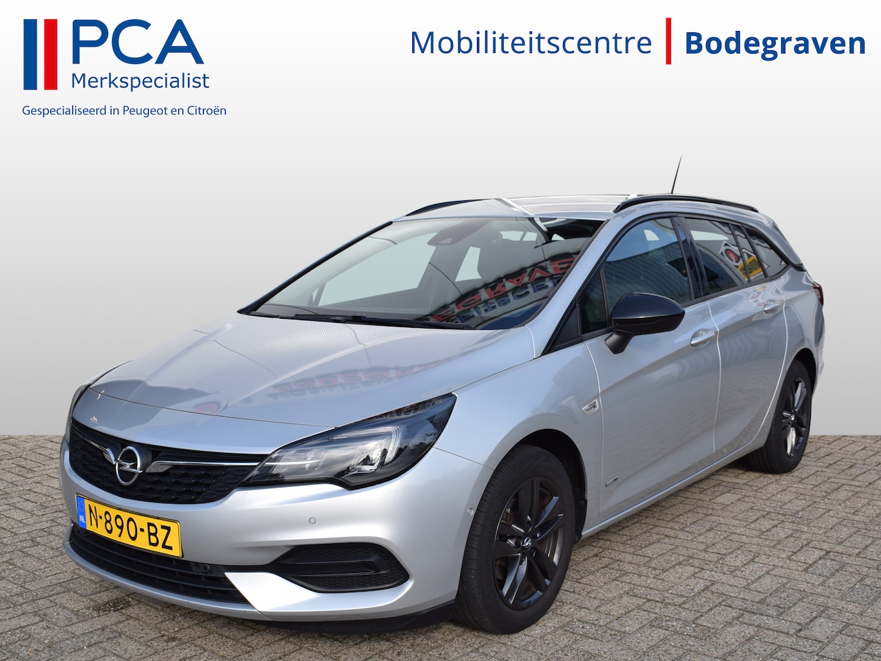 Opel Astra Sports Tourer - 1.2 Design & Tech | Camera | AGR Stoel | Climate Control | Navi - AutoWereld.nl