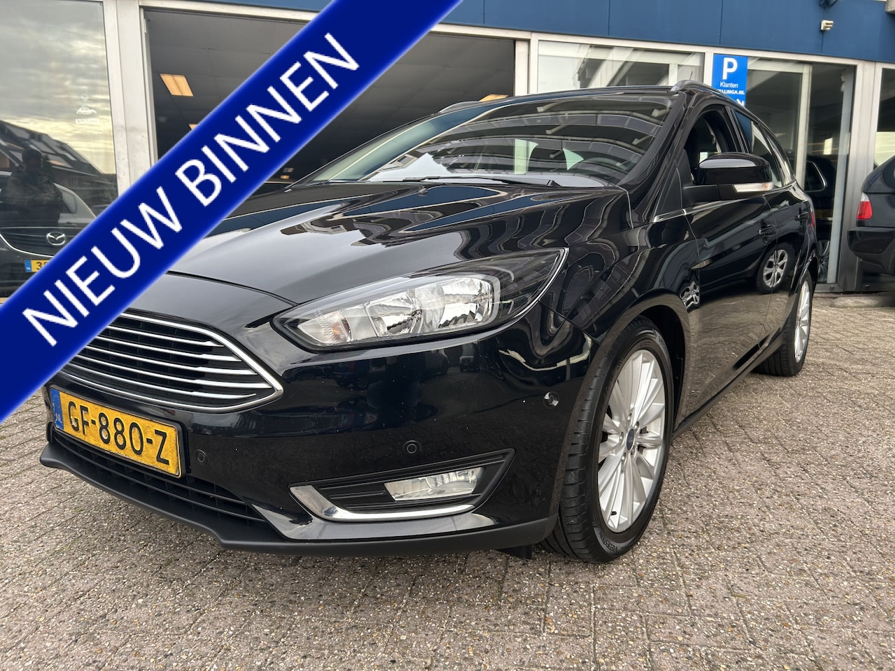 Ford Focus Wagon - 1.5 TDCI Titanium Edition navigatie airco/ecc nieuwstaat - AutoWereld.nl