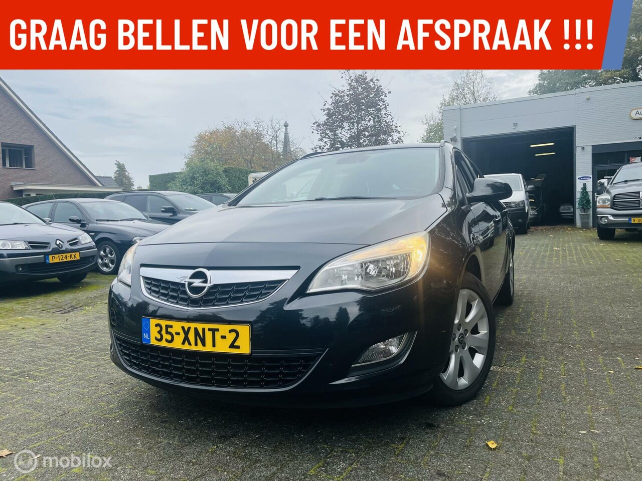 Opel Astra Sports Tourer - 1.4 Turbo Edition Navi / LM / PDC - AutoWereld.nl