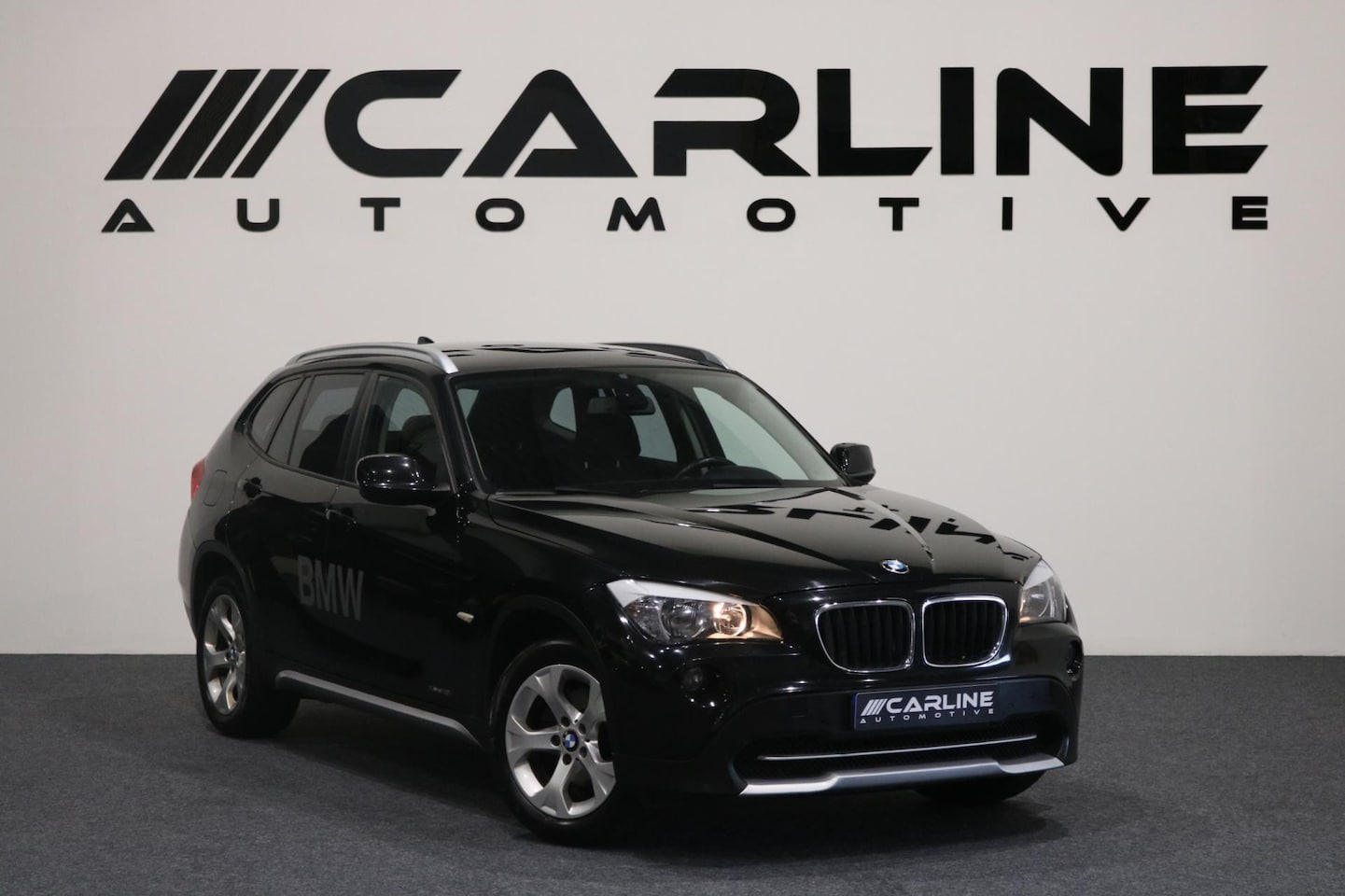 BMW X1 - SDrive18i Executive NAVI LED AIRCO GARANTIE NAP APK - AutoWereld.nl