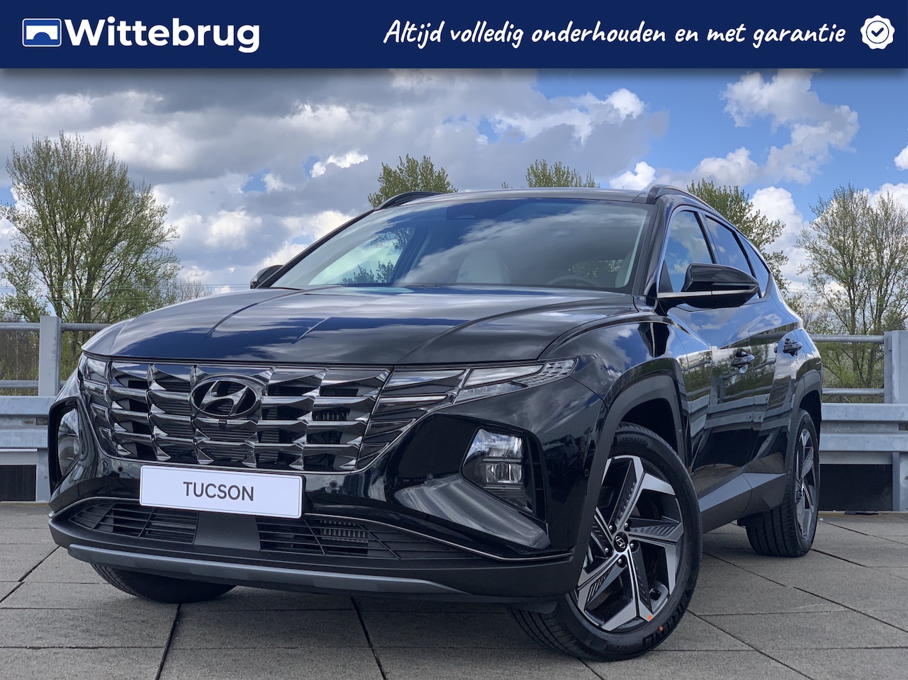 Hyundai Tucson - 1.6 T-GDI PHEV Premium 4WD LEDER | NAVIGATIE | 19 INCH VELGEN | ZEER COMPLETE AUTO - AutoWereld.nl