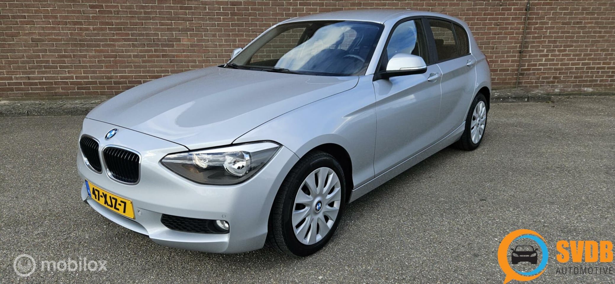 BMW 1-serie - 118i Business+ 5d turbo/170pk/navi/clima/pdc/etc - AutoWereld.nl