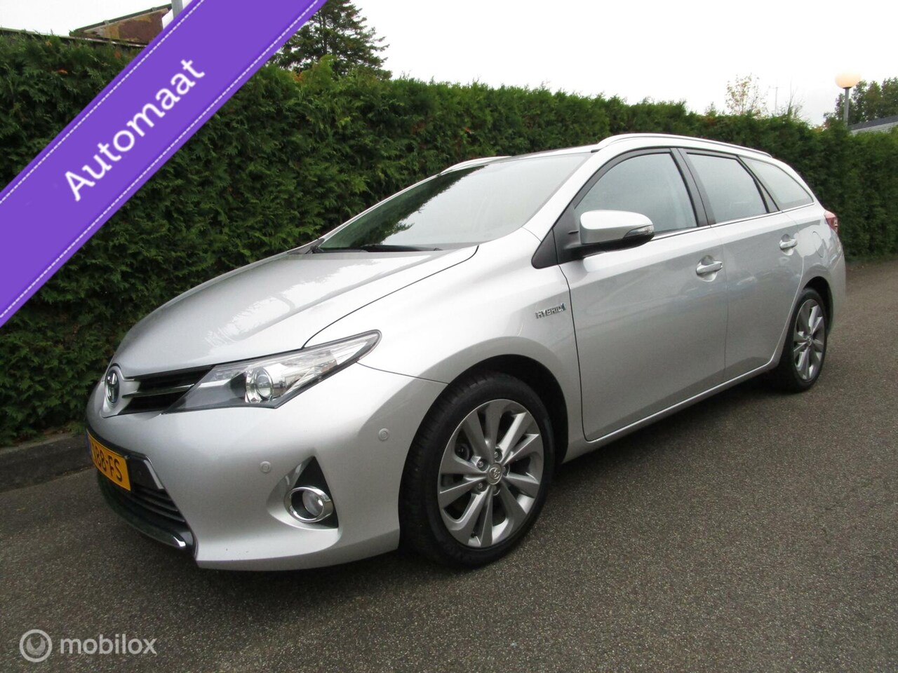 Toyota Auris Touring Sports - 1.8 Hybrid Executive - Navigatie - AutoWereld.nl