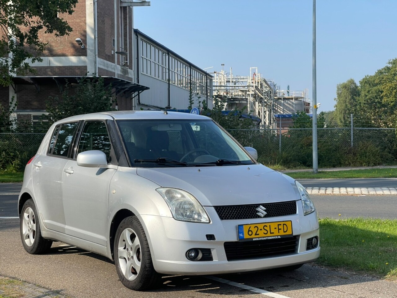 Suzuki Swift - 1.3 Exclusive | Airco | 5 Deurs - AutoWereld.nl