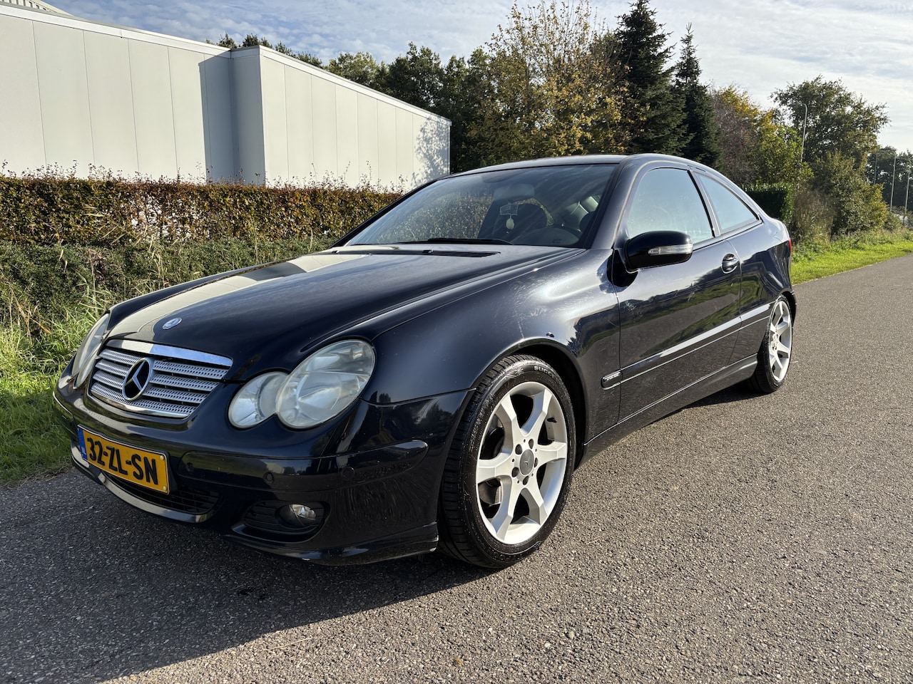 Mercedes-Benz C-klasse Sportcoupé - 180 K. / SPORT EDITION / NAVI / CRUISE / AIRCO - AutoWereld.nl