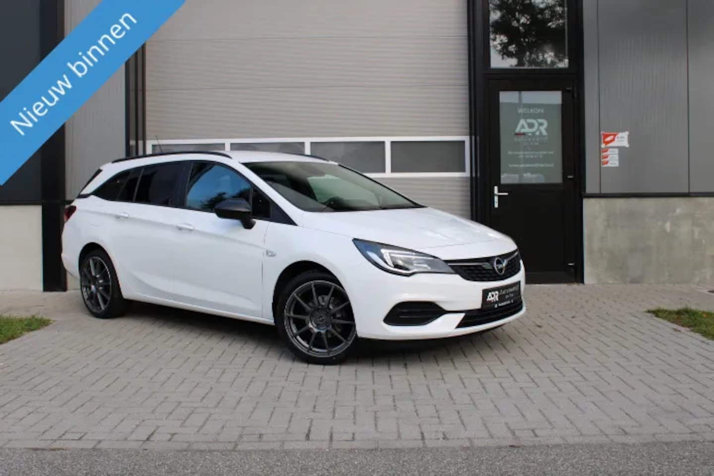 Opel Astra Sports Tourer - 1.2 110PK/18''/LED/STOELVER/AIRCO/NAVI/VOLL - AutoWereld.nl