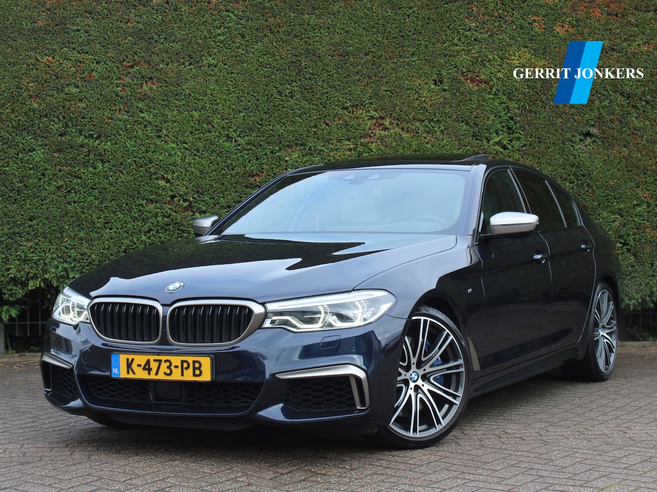 BMW 5-serie - M550i xDrive High Executive | Schuifdak | Harman Kardon | Camera - AutoWereld.nl