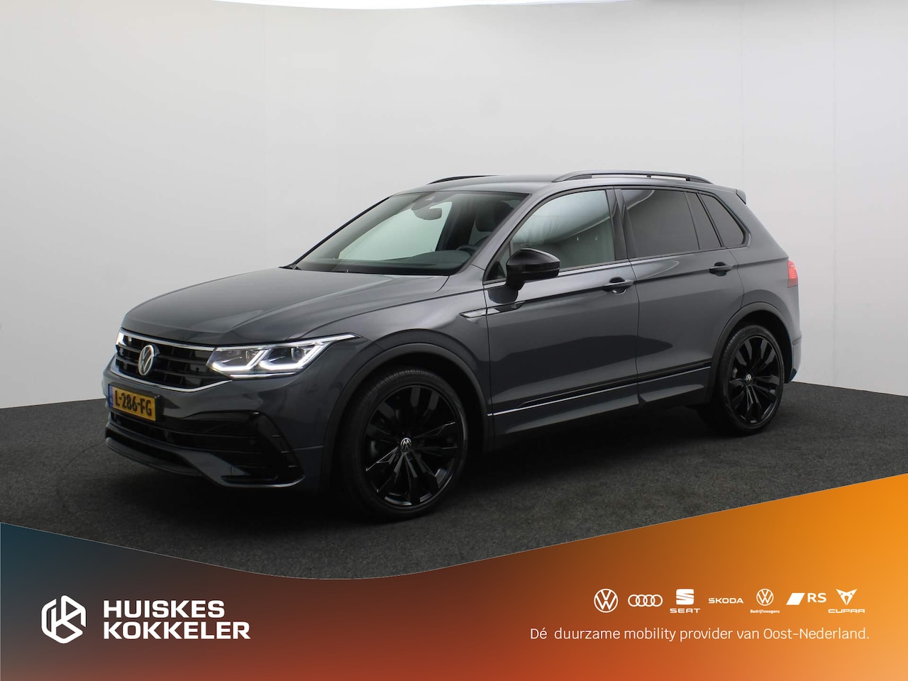 Volkswagen Tiguan - R-Line Business+ 1.5 TSI 150pk DSG Automaat Adaptive cruise control, Elektrische achterkle - AutoWereld.nl