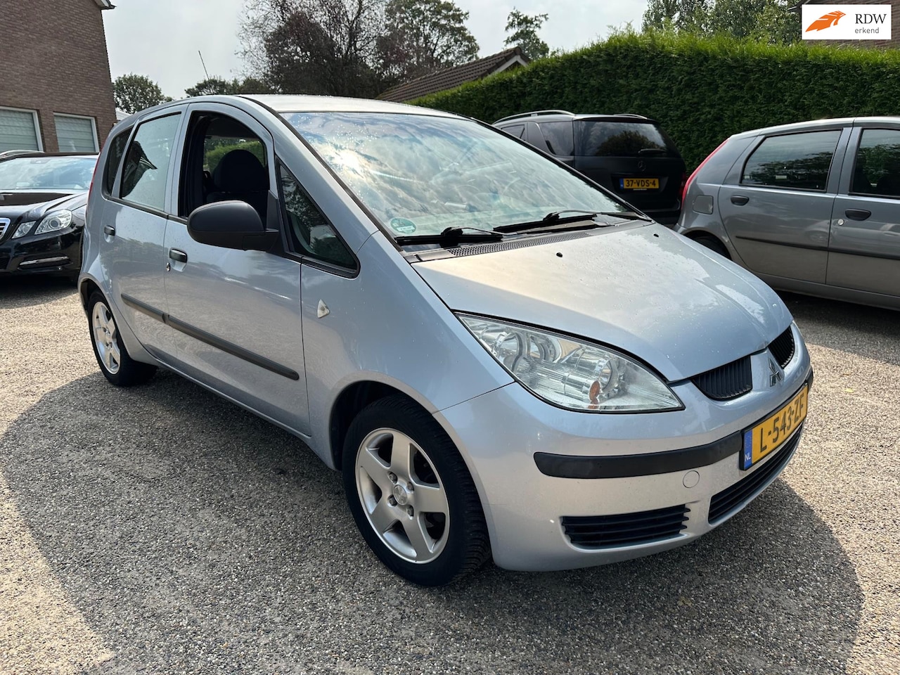 Mitsubishi Colt - 1.3 Inform 1.3 Inform ( Auto gaat moeilijk in zijn achteruit ) - AutoWereld.nl