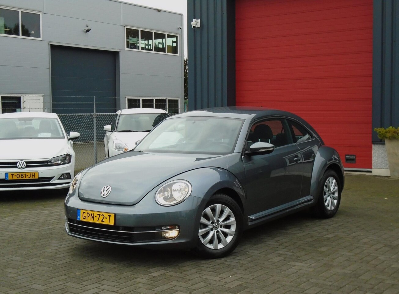 Volkswagen Beetle - 1.2 TSI Design BlueMotion 1.2 TSI Design BlueMotion,Airco,Navi,Cruise - AutoWereld.nl