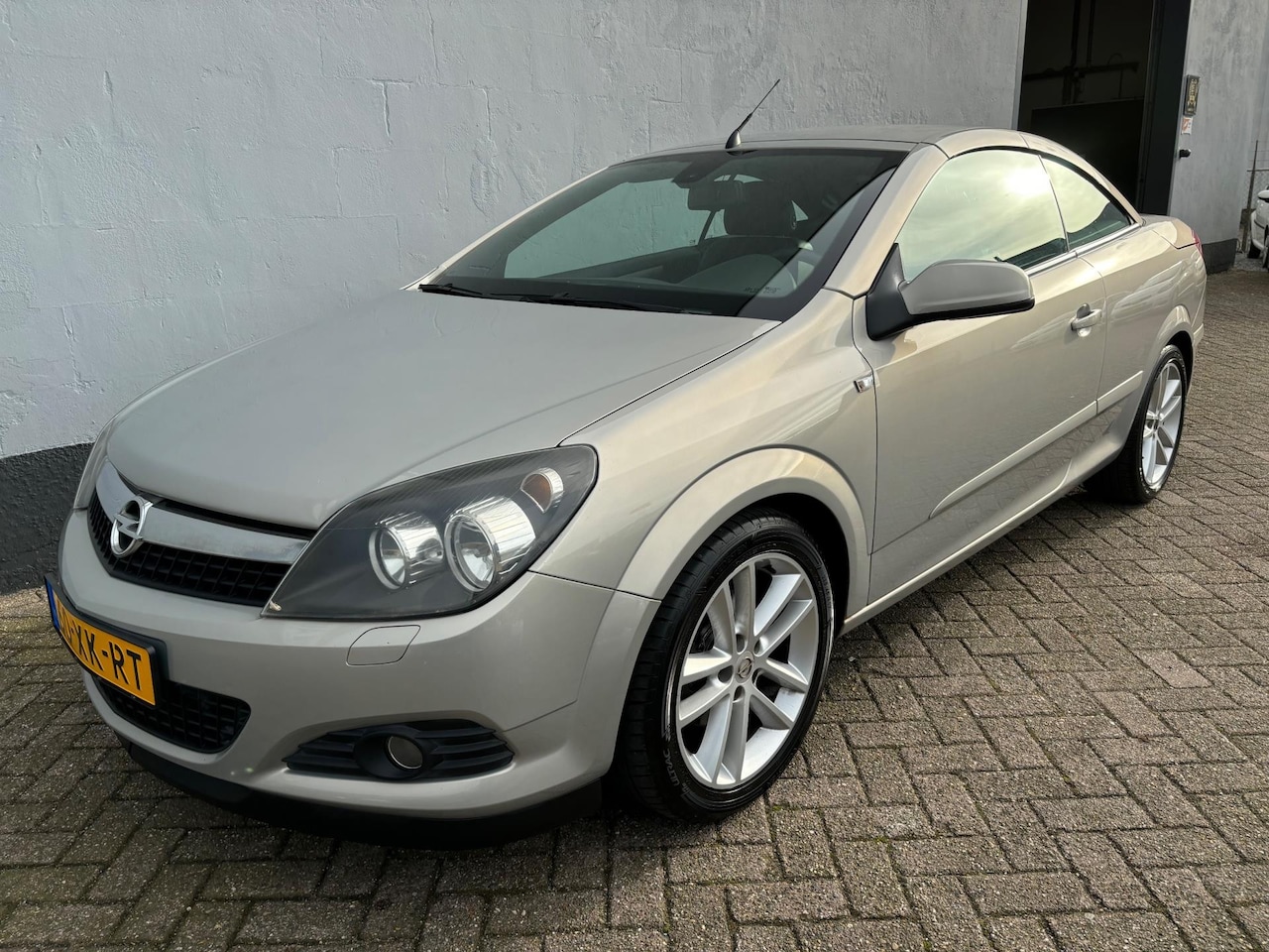 Opel Astra TwinTop - 1.8 Cosmo Cabriolet - Navigatie - AutoWereld.nl