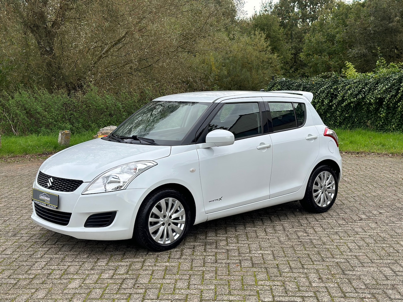 Suzuki Swift - 1.2 Exclusive 94PK I 5DRS I SPORTIEF I NWE APK I VOLL ONDH - AutoWereld.nl