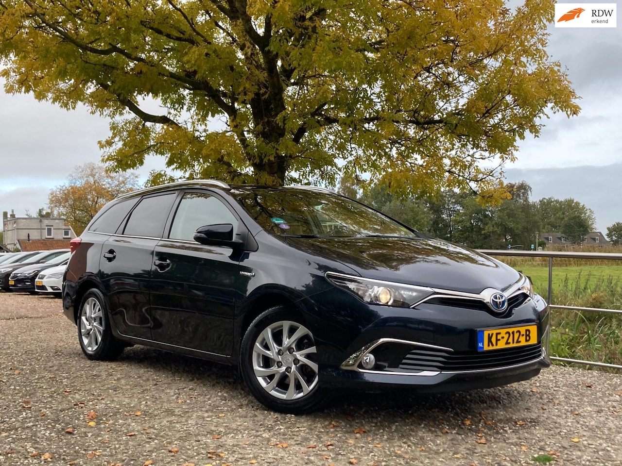 Toyota Auris Touring Sports - 1.8 Hybrid Executive | Cruise + Clima + Navi nu € 11.975,-!!! - AutoWereld.nl