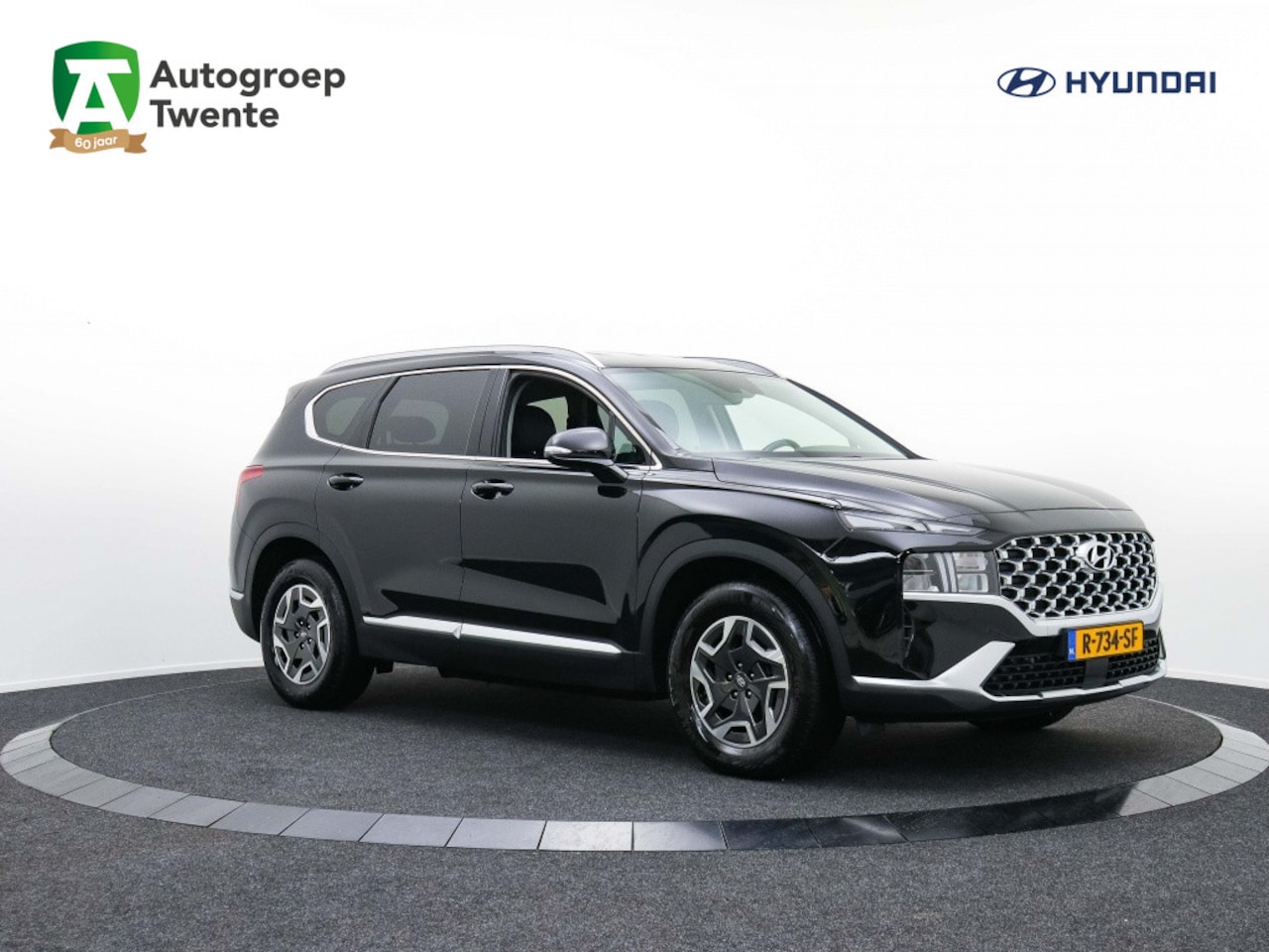 Hyundai Santa Fe - 1.6 T-GDI HYBRID Comfort 7-ZITTER | Trekhaak - AutoWereld.nl