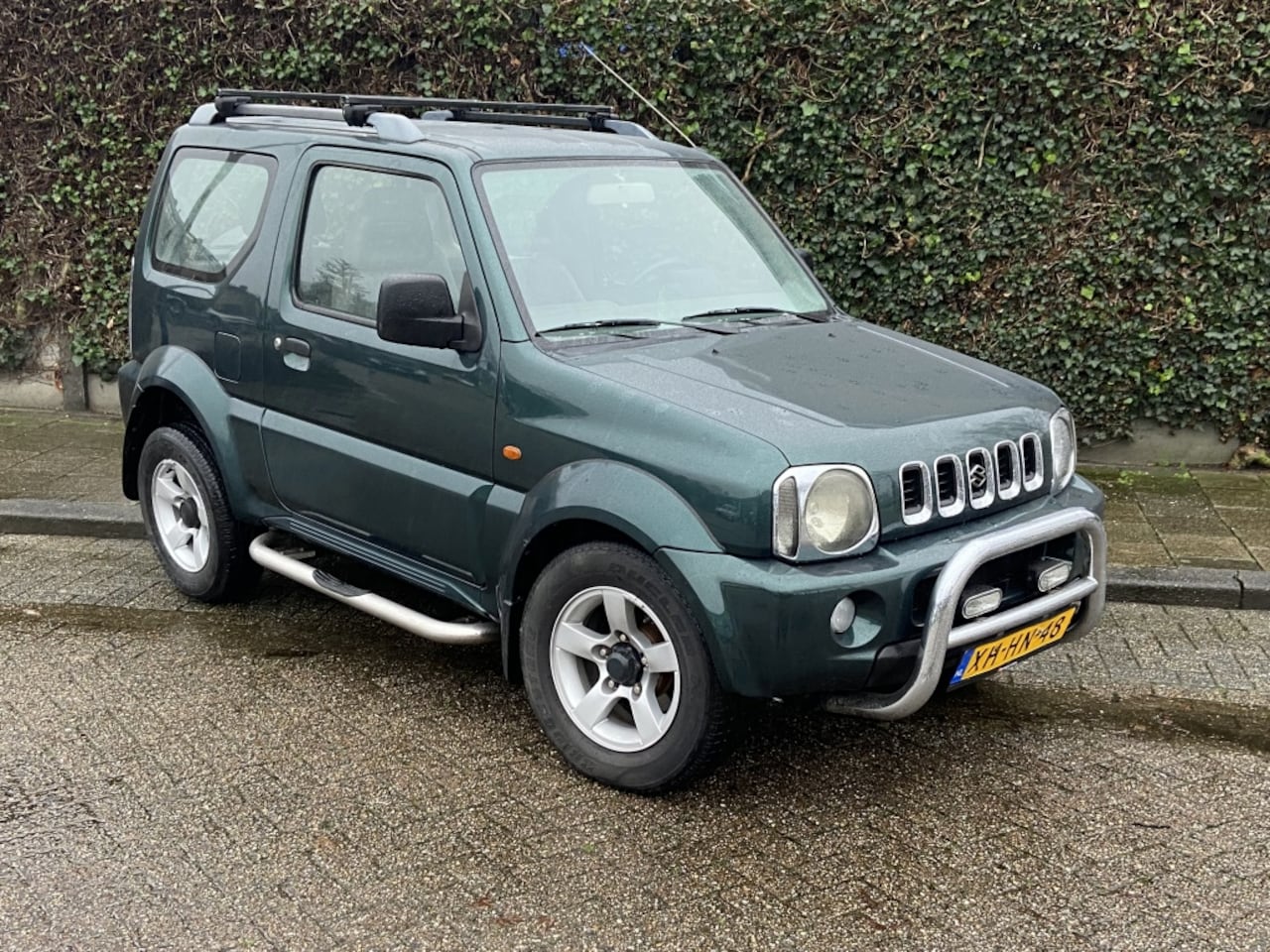 Suzuki Jimny - 1.3 JLX 4WD - AutoWereld.nl