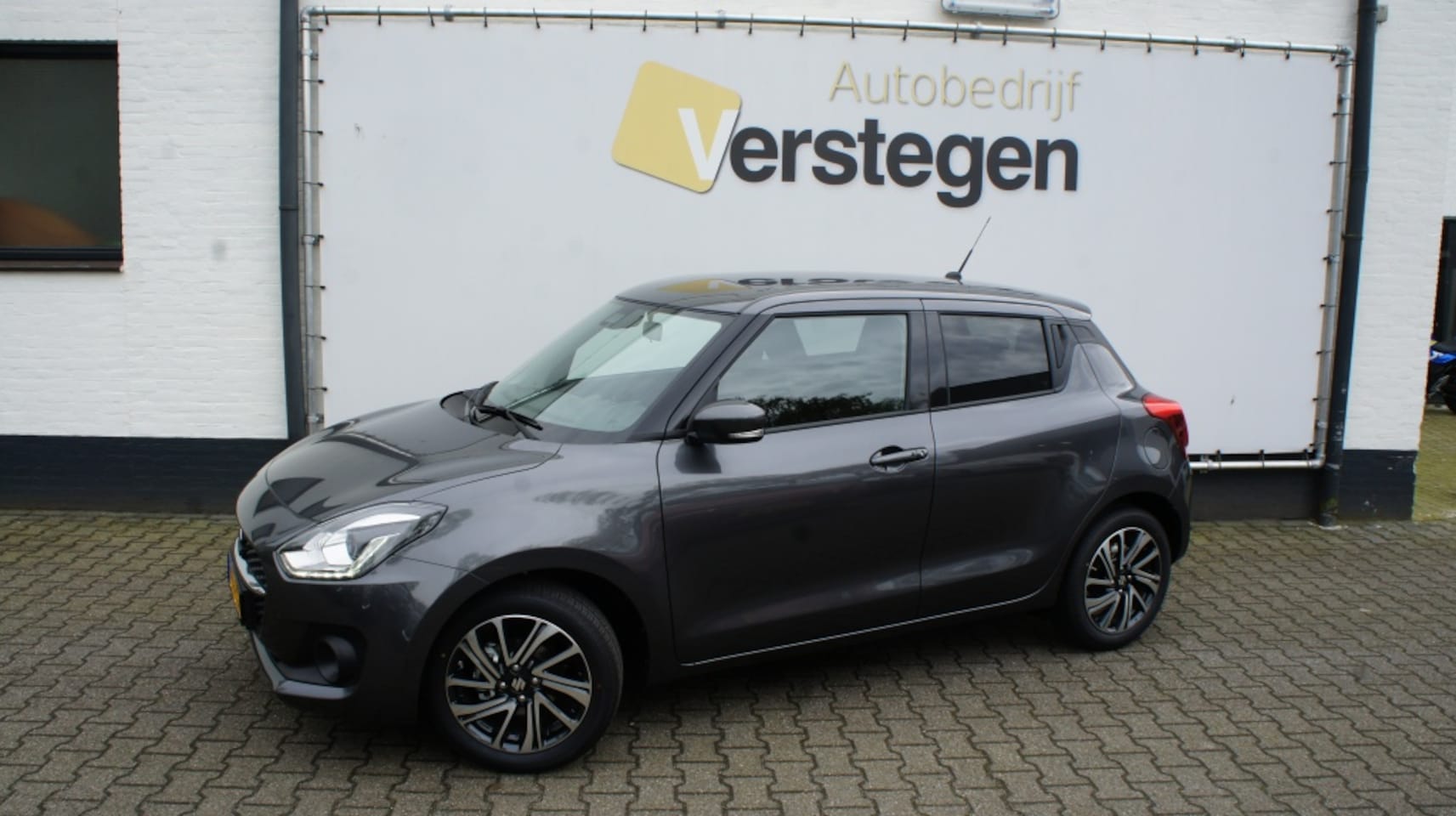 Suzuki Swift - 1.2 Style Smart Hybr - AutoWereld.nl