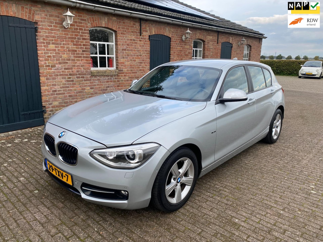 BMW 1-serie - 116i Business+Sport-line met leder - AutoWereld.nl