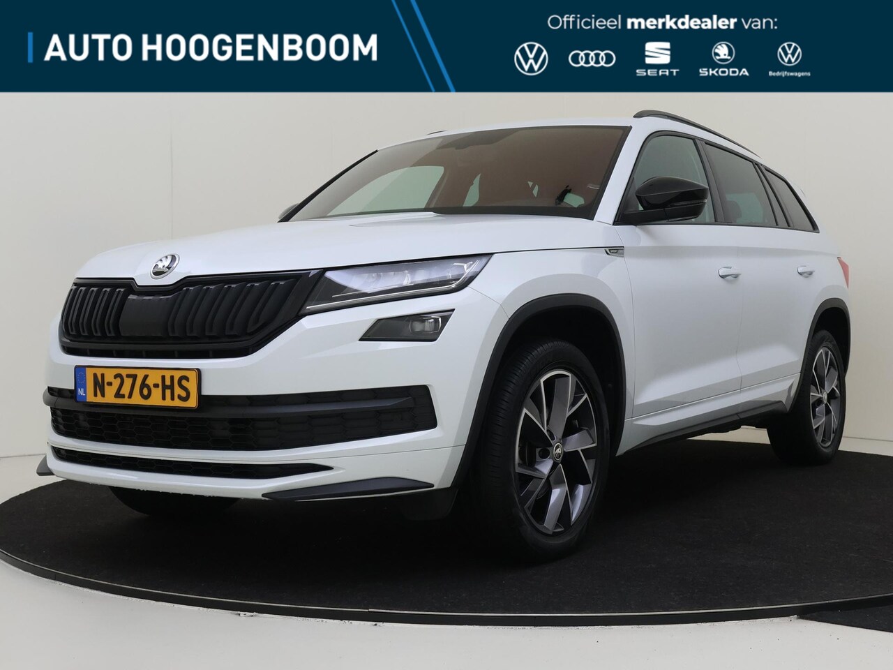 Skoda Kodiaq - 1.5 TSI Sportline Business | Trekhaak | Stoel- en stuurwielverwarming | Navigatie | Achter - AutoWereld.nl