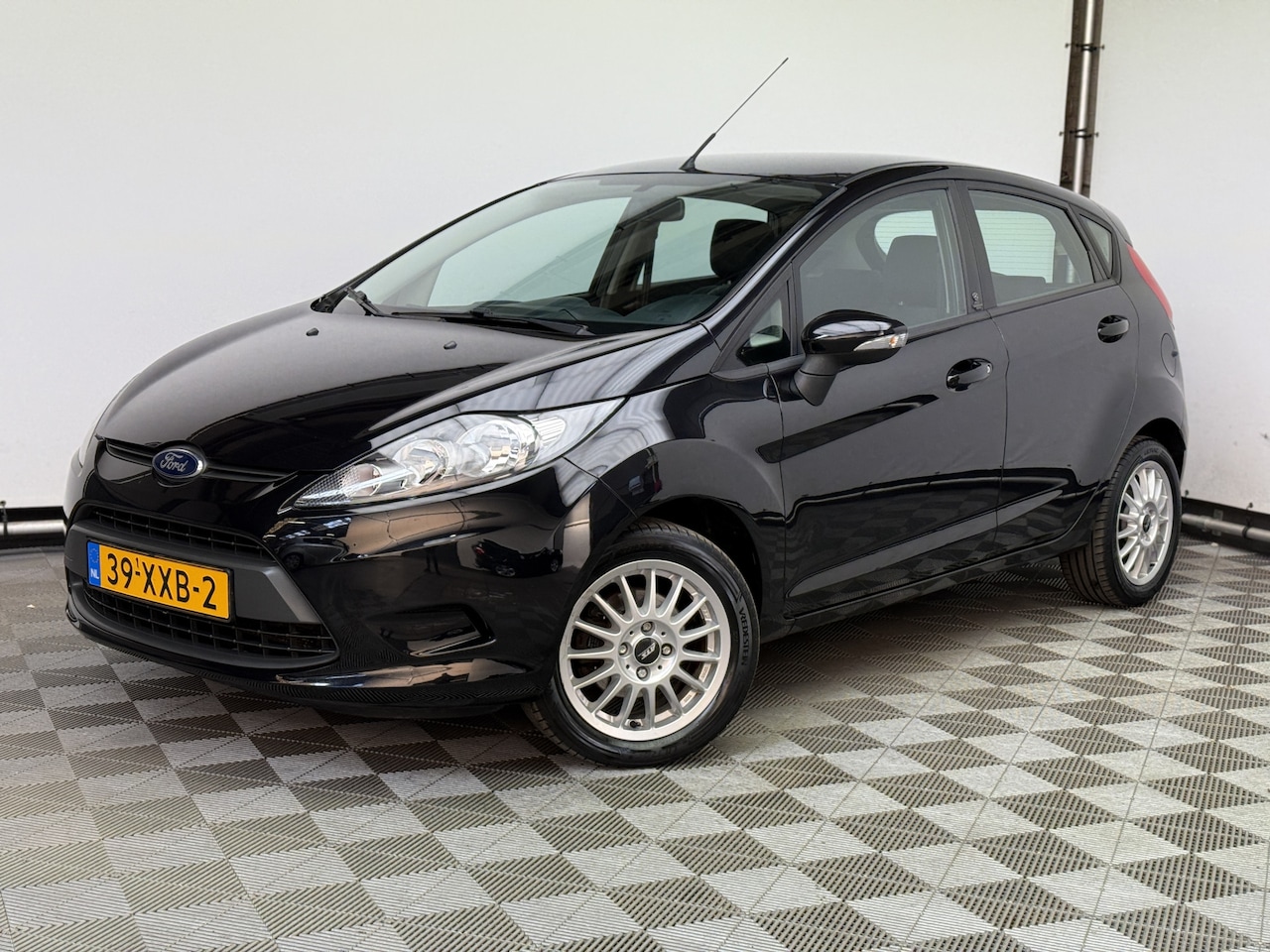 Ford Fiesta - 1.25 Champion 5-drs Airco LM15" NL Auto - AutoWereld.nl