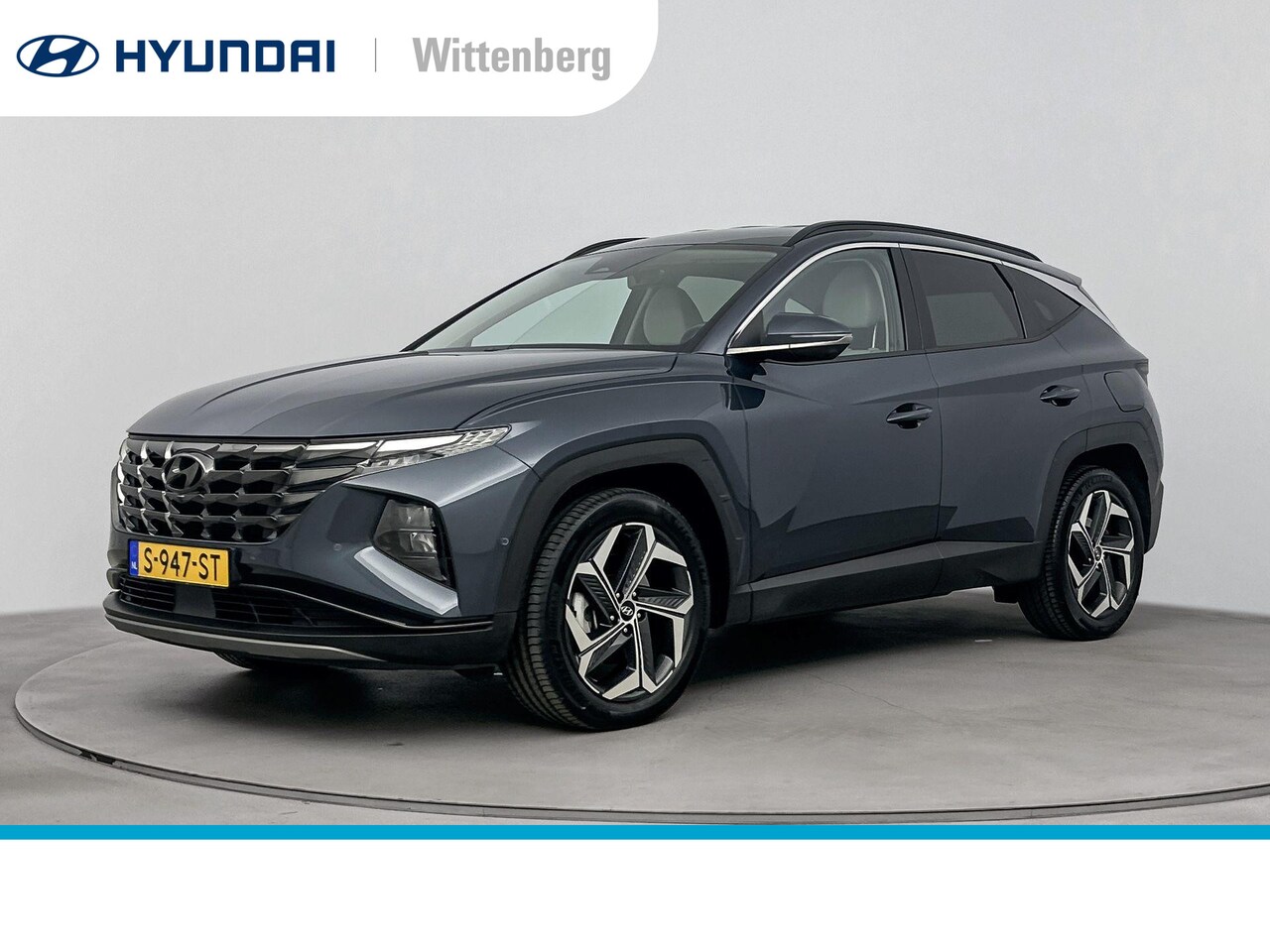 Hyundai Tucson - 1.6 T-GDI HEV Premium | Trekhaak | Leder | Stoelventilatie | Navigatie | Camera | Keyless - AutoWereld.nl