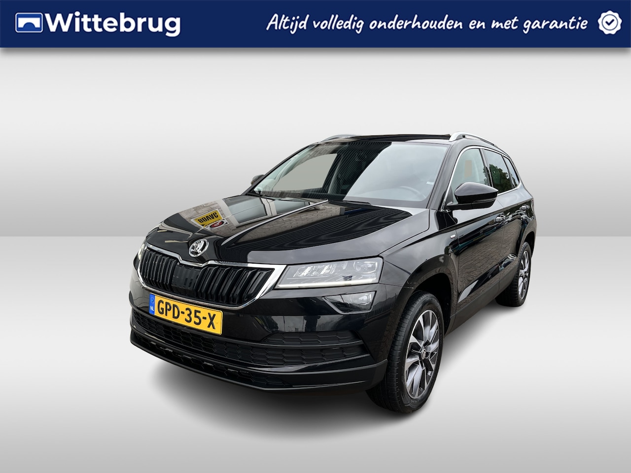 Skoda Karoq - 1.0 TSI Ambition Drive 125 / PARK. SENSOREN/ CRUISE/ STOEL VERWARM. V EN A/ KEYLESS/ APP C - AutoWereld.nl