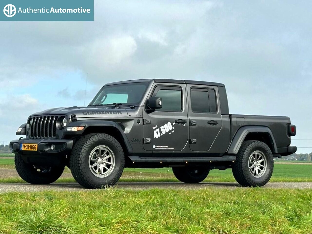 Jeep Gladiator - sport 3.6i Benzine Grijs kenteken NL..NIEUW.! - AutoWereld.nl