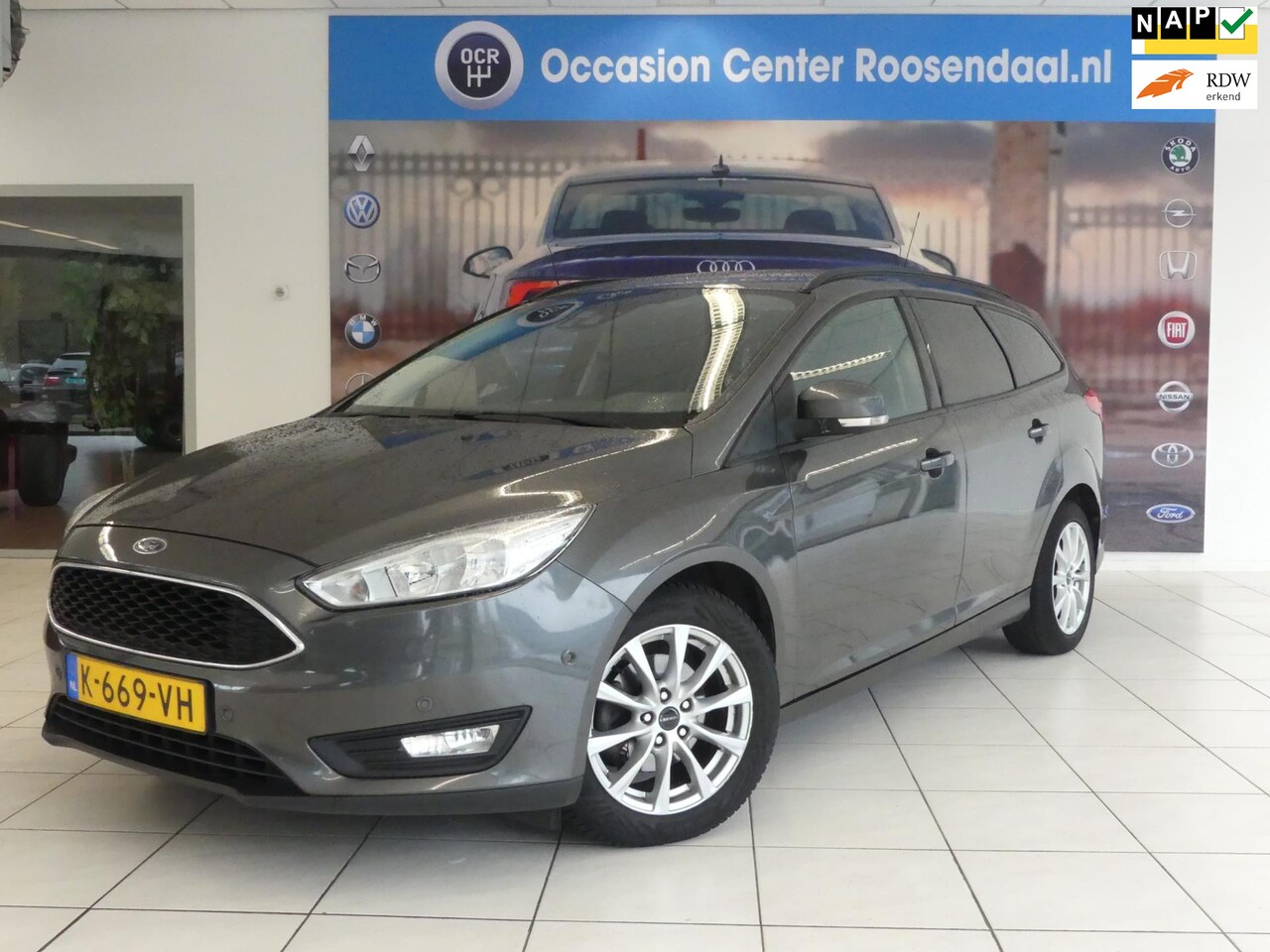 Ford Focus Wagon - 1.0 Titanium ECC Navigatie Cruise Control Lmv PDC - AutoWereld.nl